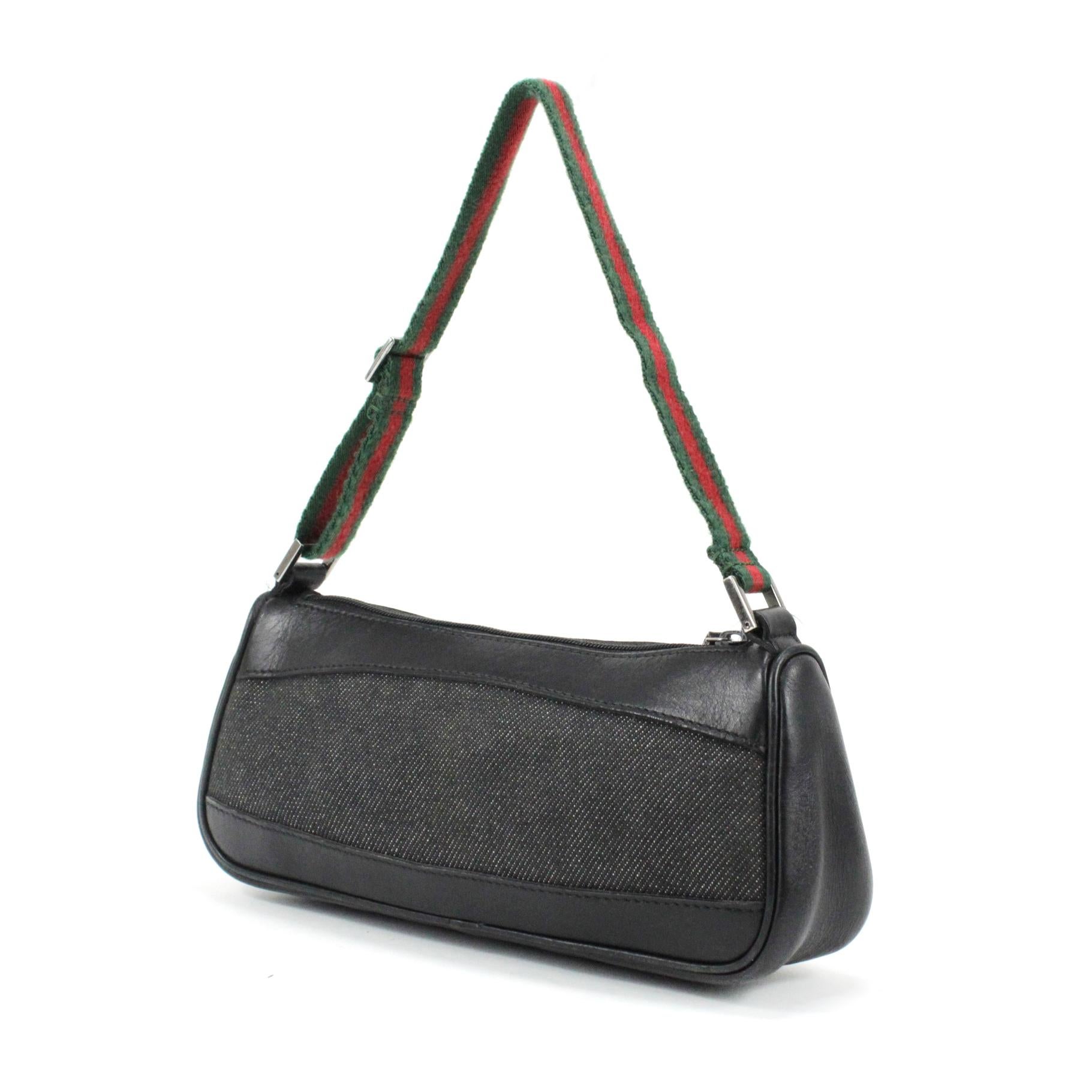 Gucci bag in anthracite denim + leather color black, red and green adjustable handle. 

Condition: 
Good.

Measurements: 
Width: 20 cm
Height: 9 cm
Depth: 5,5 cm 
