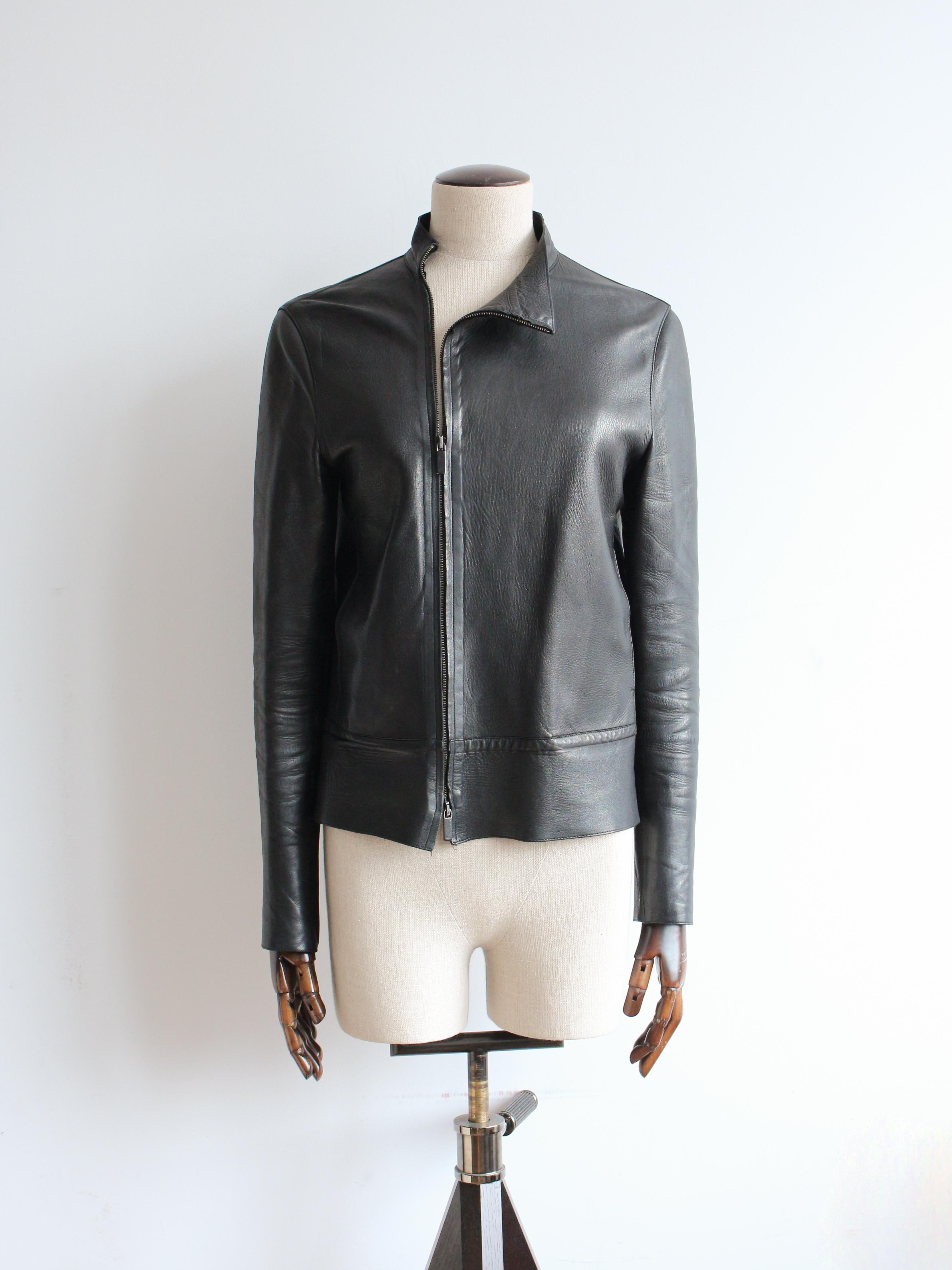 Gucci by Tom Ford Autumn/Winter 1999 asymmetric leather zipped moto style jacket.

Tagged size IT40.

In good condition with general signs of wear throughout but no significant flaws.

