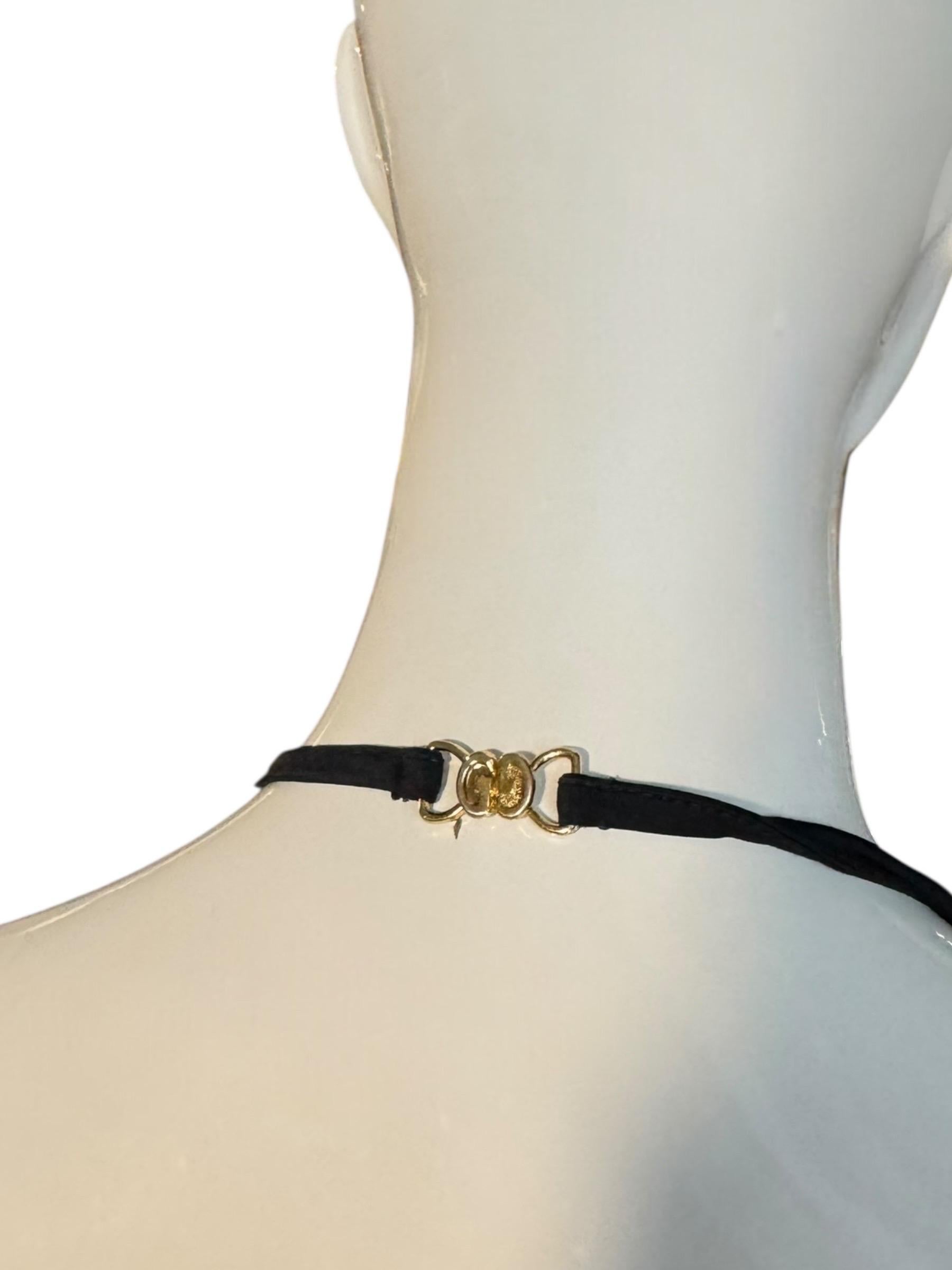 Bikini nero di Gucci by Tom Ford con minuteria dorata 