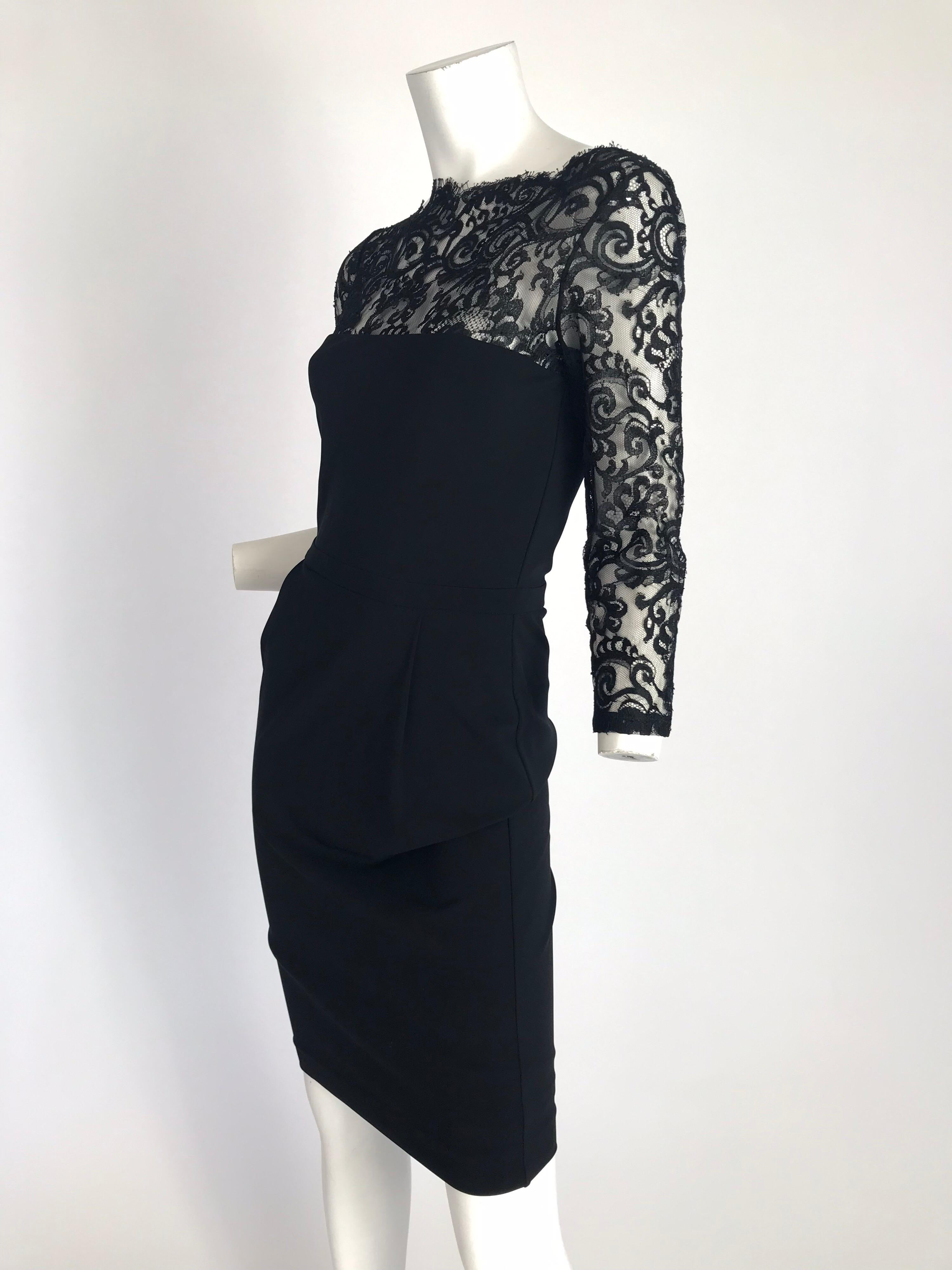 Black Gucci by Tom Ford lace long sleeve dress with bateau neck and concealed zip closure at back. Condition: Excellent. Size Small 

Waist: 26