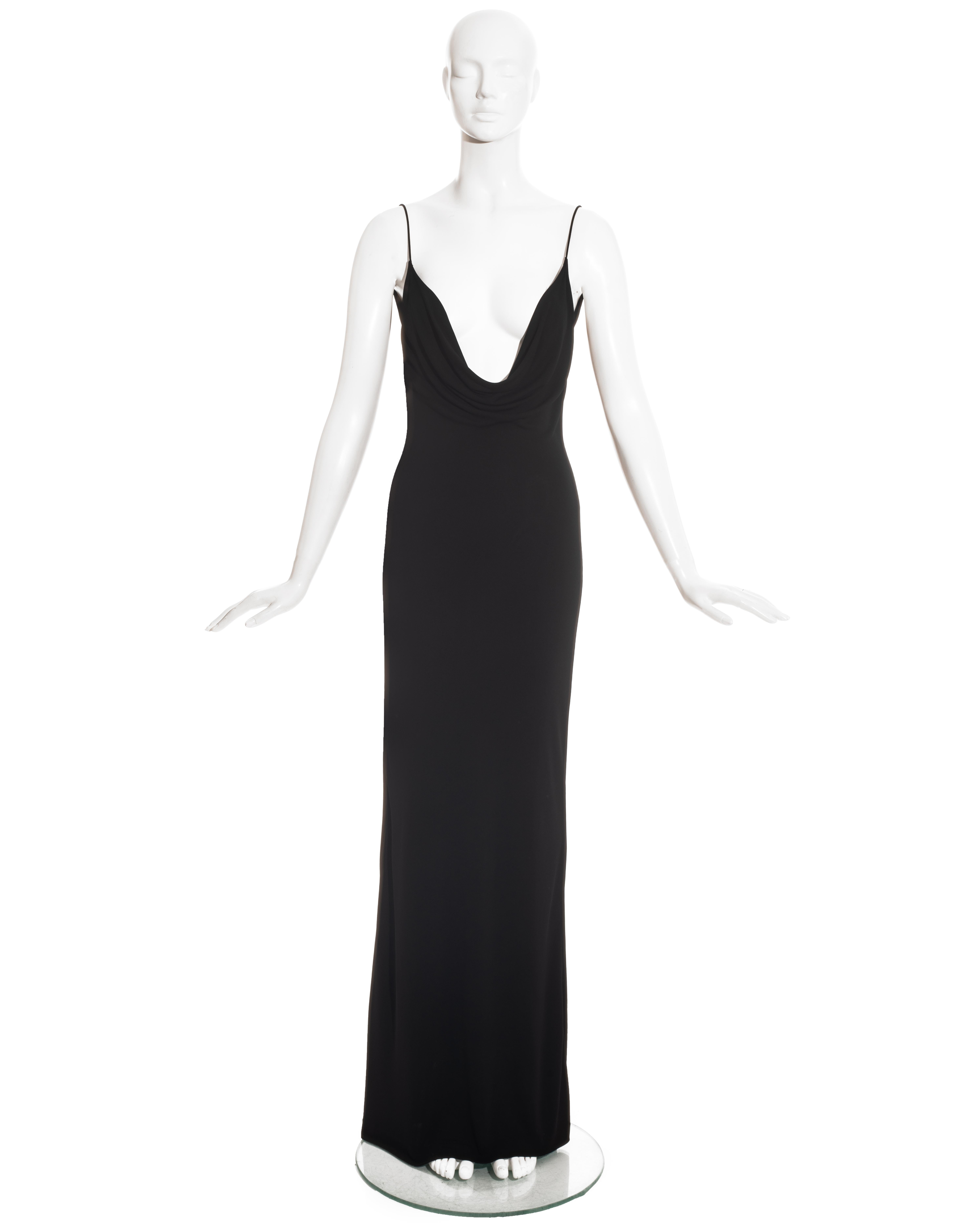 Gucci by Tom Ford black rayon jersey maxi dress with spaghetti straps and low-plunge cowl neckline. 

Fall-Winter 1997
