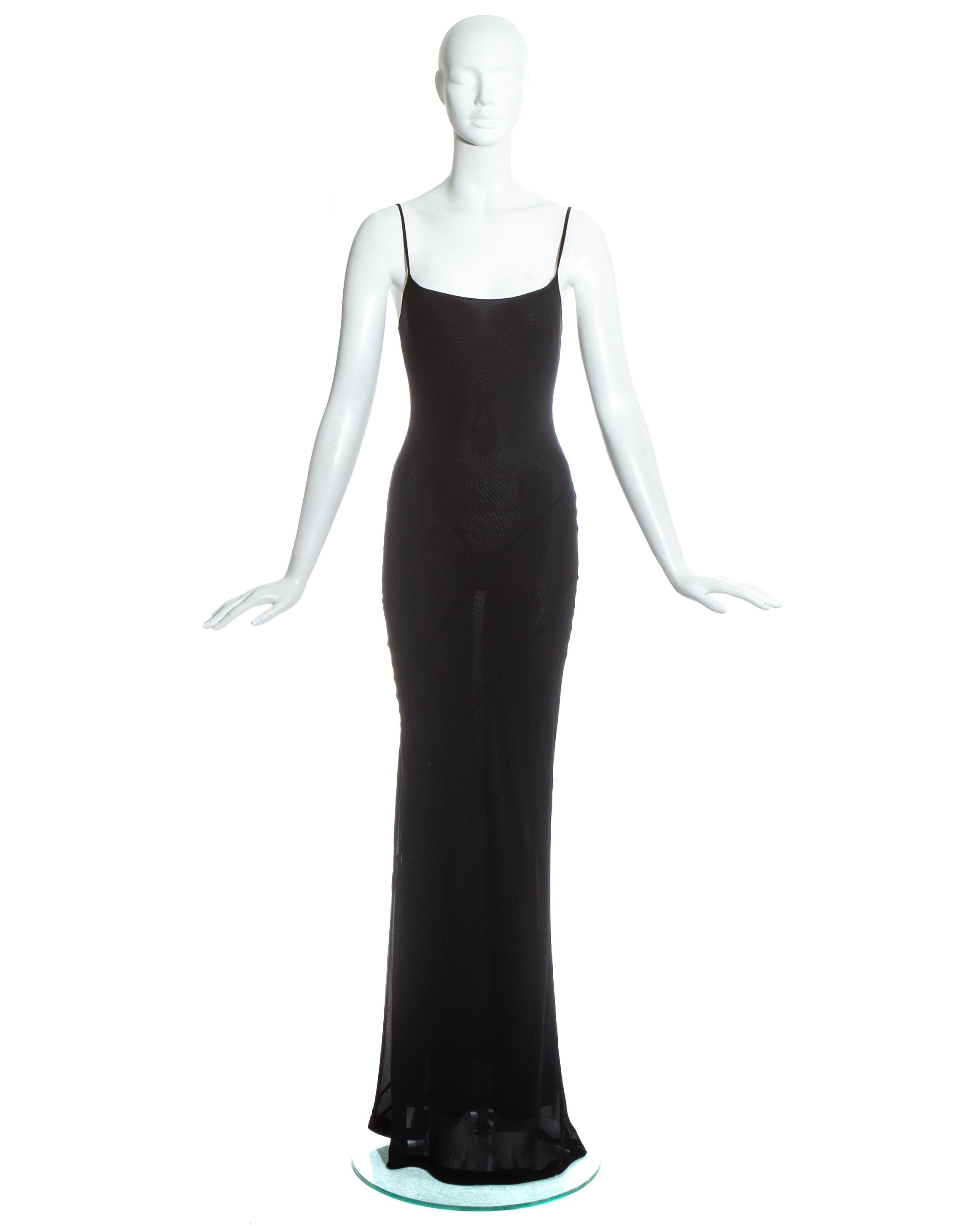 Gucci by Tom Ford black silk bias cut semi sheer evening dress with spaghetti straps..

Spring-Summer 1997