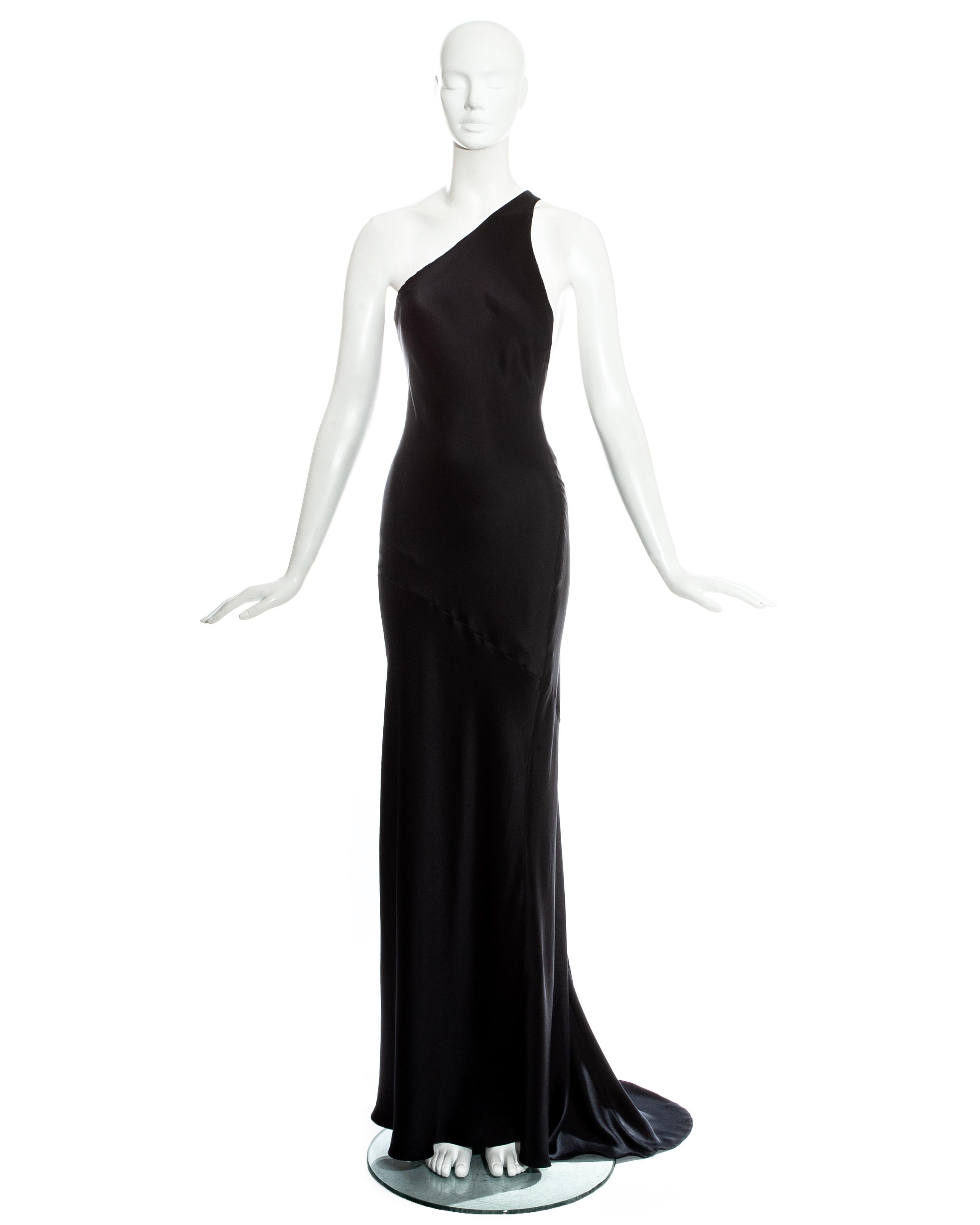 Gucci by Tom Ford; black silk bias cut evening maxi dress with open back and sweeping train. Silk chiffon lining. 

Spring-Summer 2000