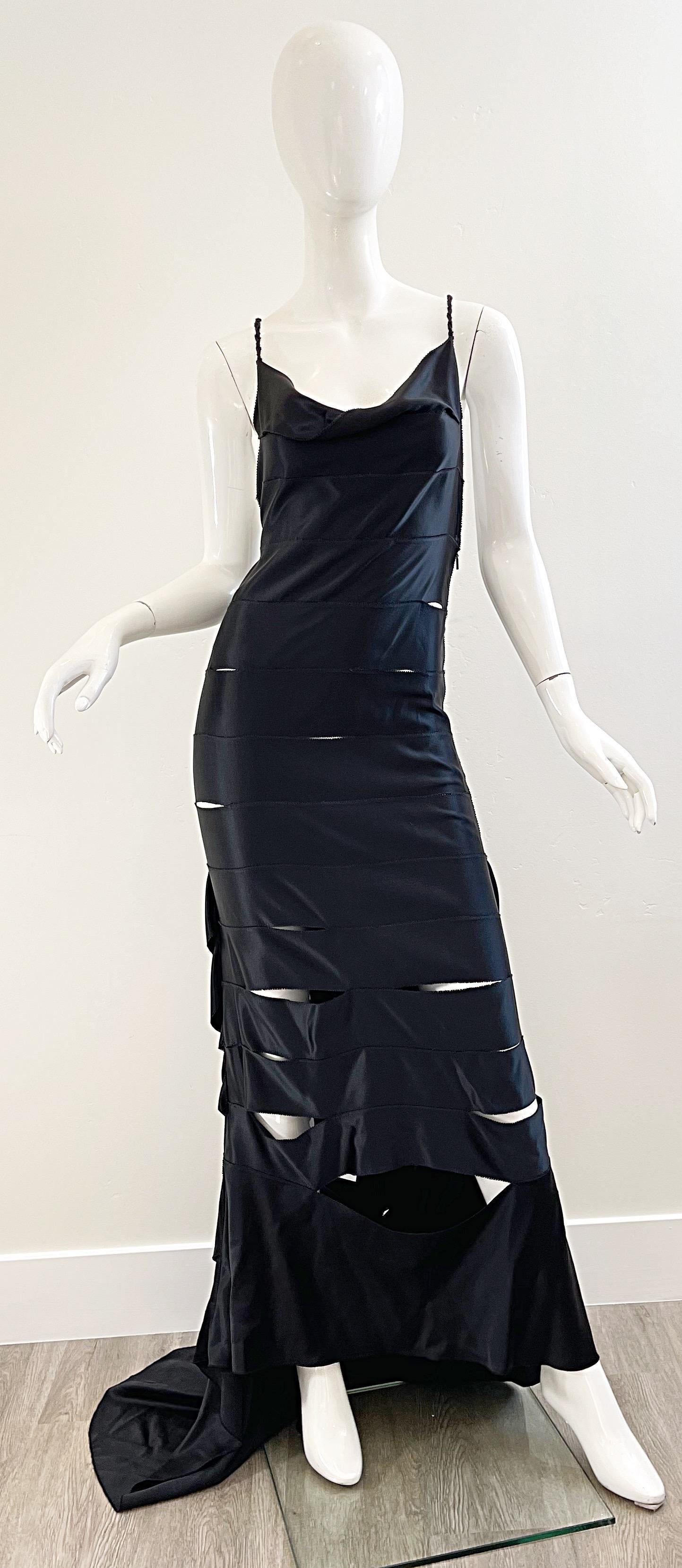 Sexy GUCCI by TOM FORD Fall / Winter 2002 vintage black silk cut-out evening gown ! Features a tailored bodice with braided racerback. Shredded look reveals just the right amount of skin. Hidden zipper up the side with hook-and-eye closure.
