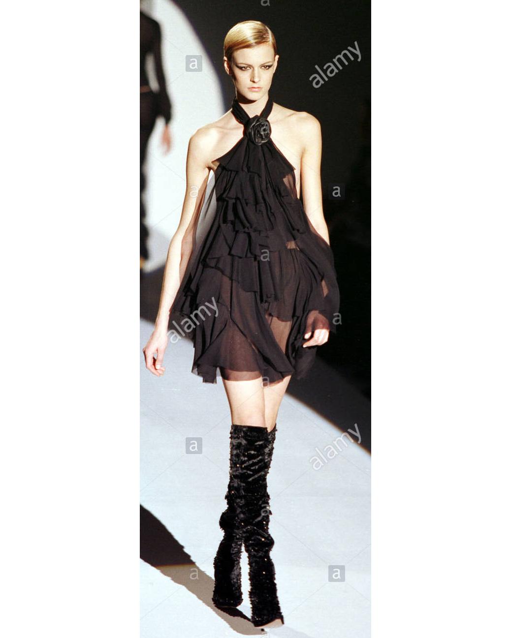 ▪ Gucci black embellished over knee boots
▪ Designed by Tom Ford
▪ Pointed toe 
▪ Brown wooden heel 
▪ Zipper with leather pull at inseam
▪ Hand-sewn black beads throughout 
▪ Size EU 38 C
▪ Fall-Winter 1999