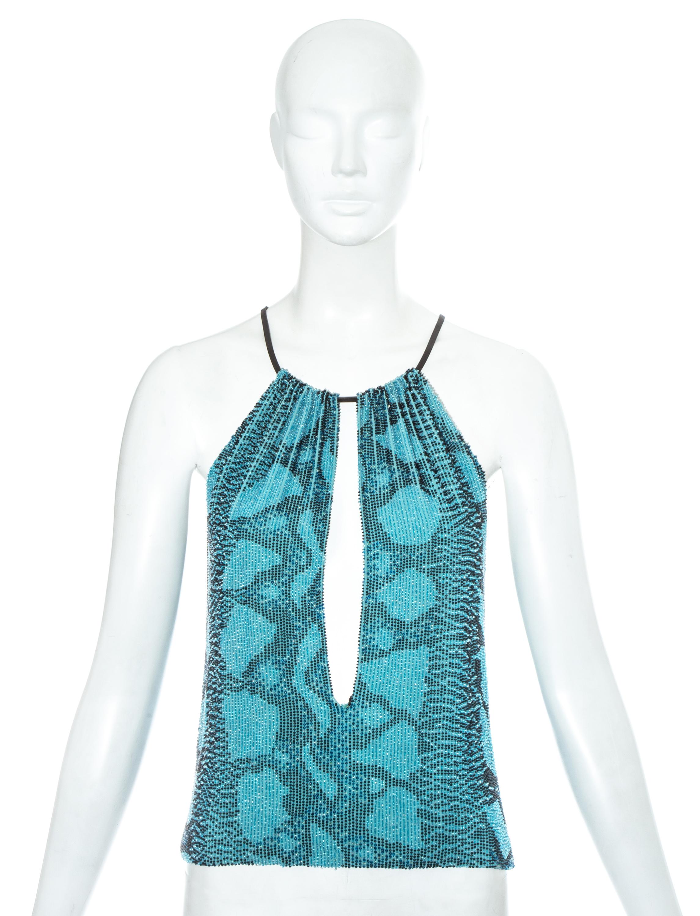 Gucci by Tom Ford, blue beaded silk evening top in a snakeskin pattern. Black leather straps with Gucci signed metal clasp. 

Spring-Summer 2000