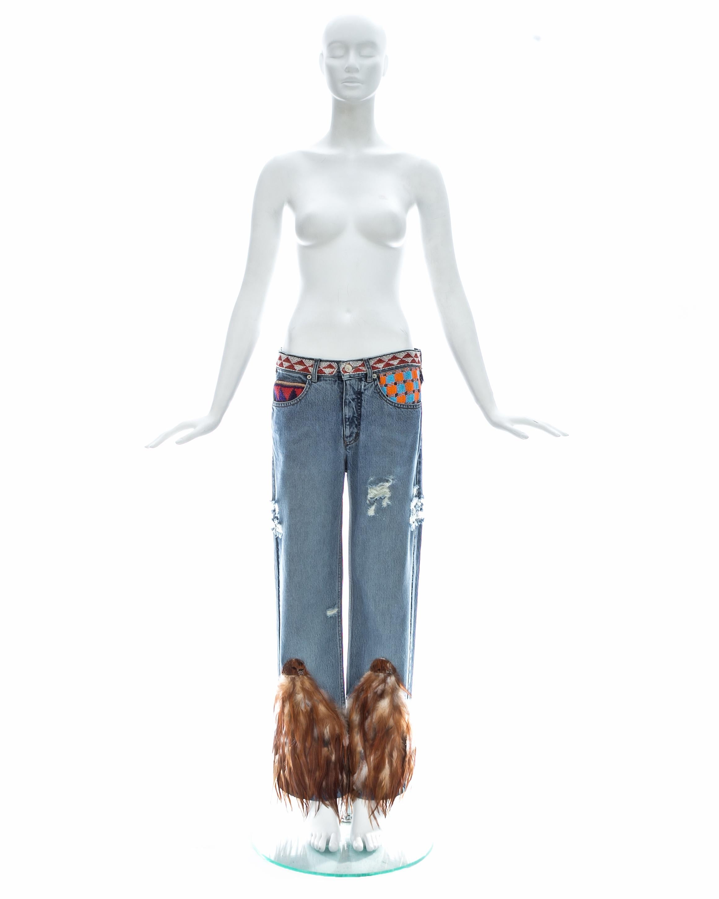 jeans with feathers on bottom