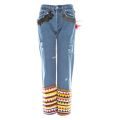 Vintage Gucci by Tom Ford blue denim beaded slim-fit jeans with feathers, ss 1999