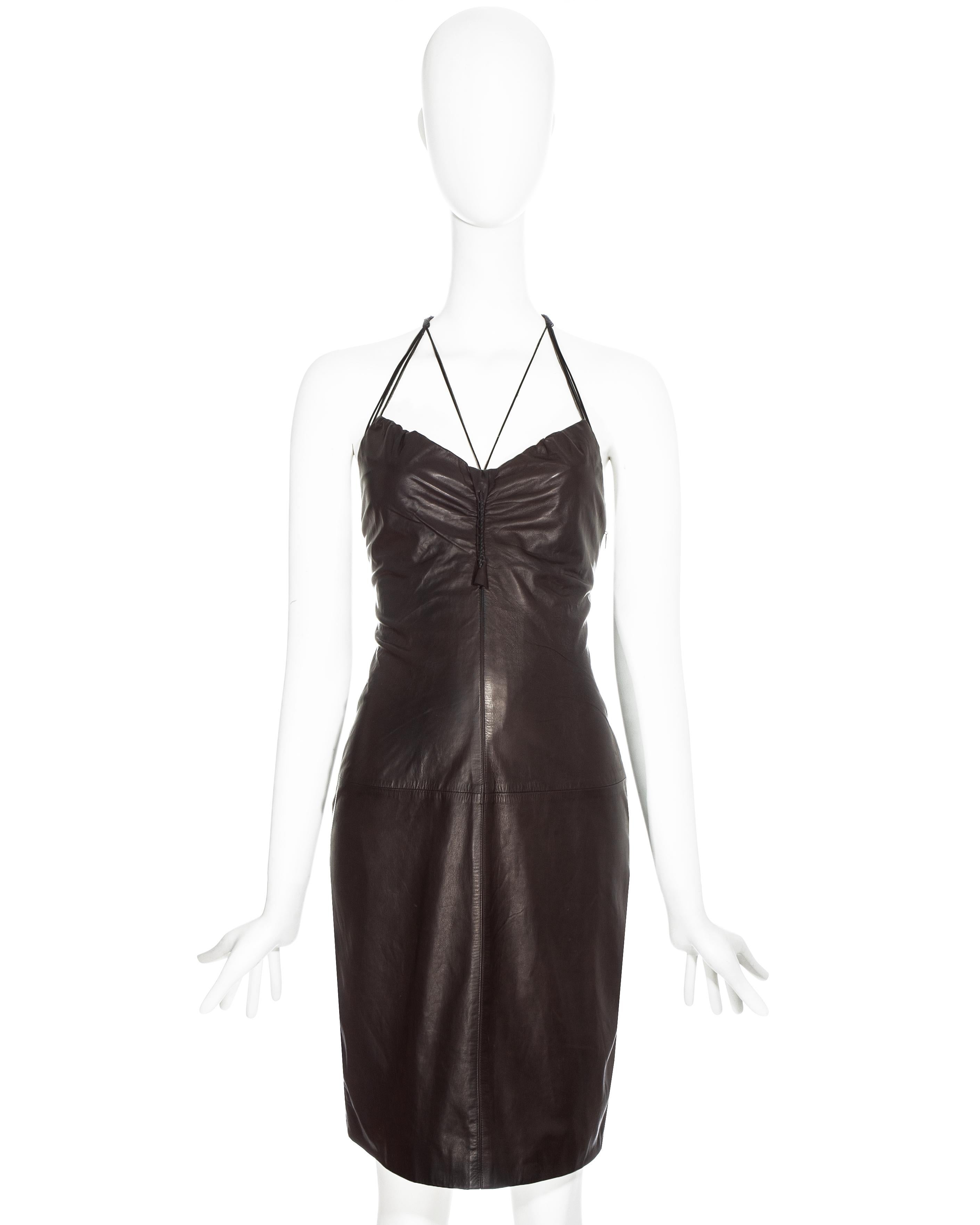 Gucci by Tom Ford brown leather dress with braided halter-neck straps and invisible zip fastening.

Spring-Summer 2003