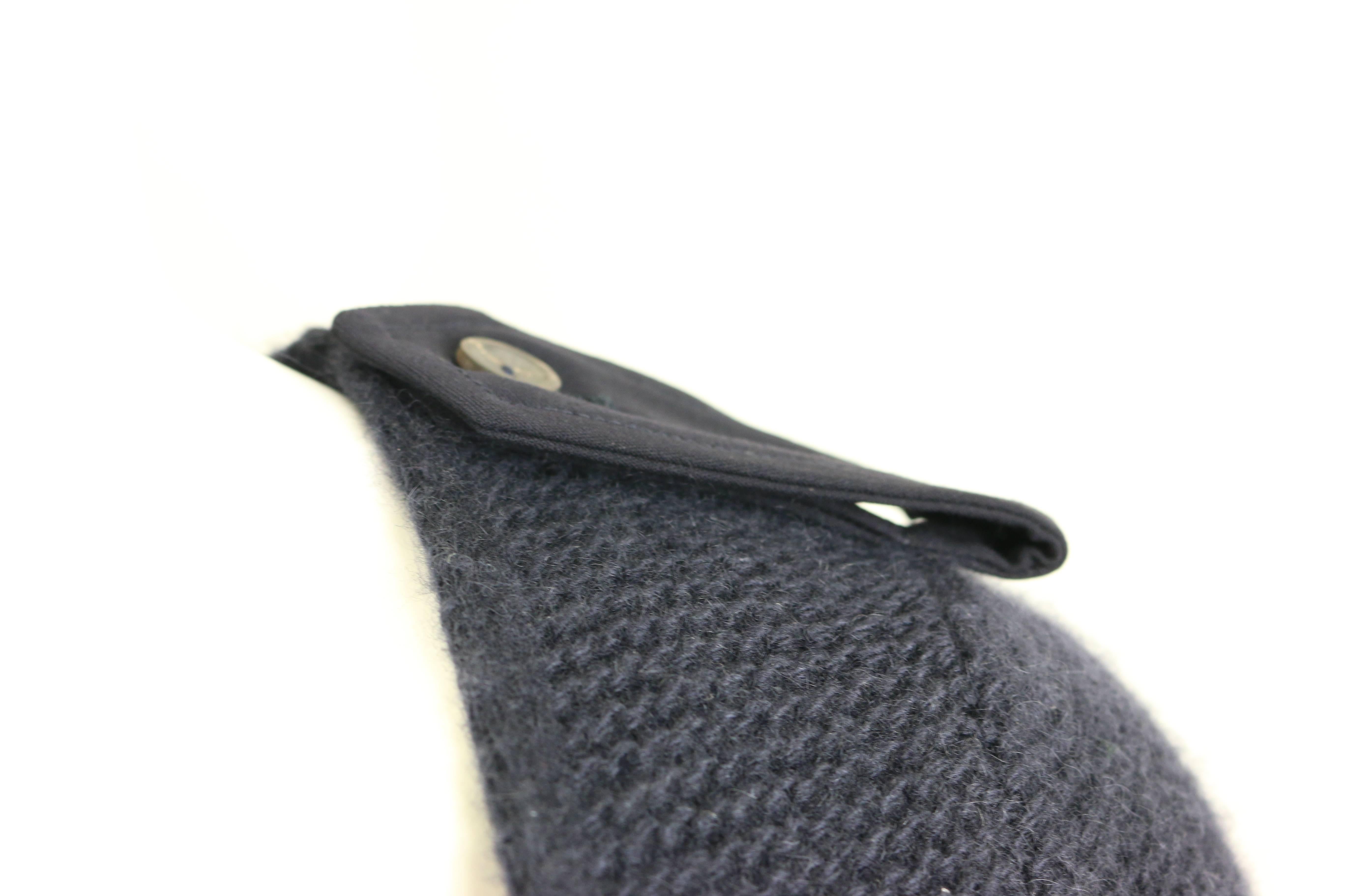 - Gucci by Tom Ford dark blue wool heavy knitted maxi dress from Fall 1996 collection. 

- Military inspired shoulder details. 

- Size M. 

- Shoulder to shoulder: 13 inches. 
  Bust: around 26 inches. 
  Waist: around 28 inches. 
  Length: 60