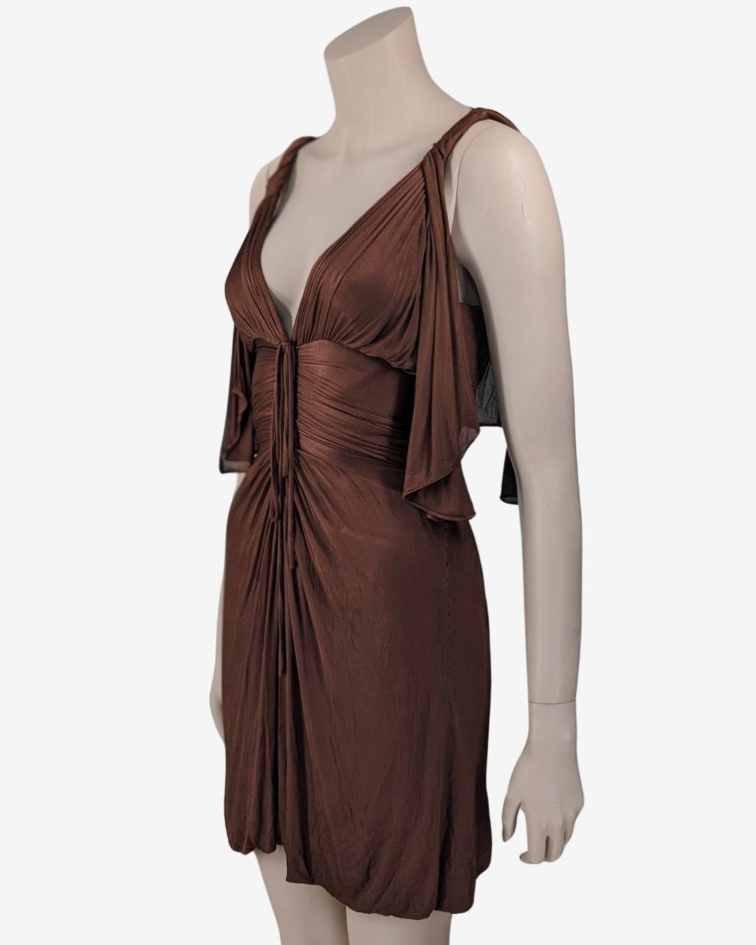 By Tom Ford iconic draped mini dress from the runway S/S 2003.

- Deep V neckline
- Light and soft fabric
- Velvet spaghetti straps
- Mini dress
- Zip on the back
- Opened sleeves you can tied them around the arm

Fits XS, small S
 

Flat