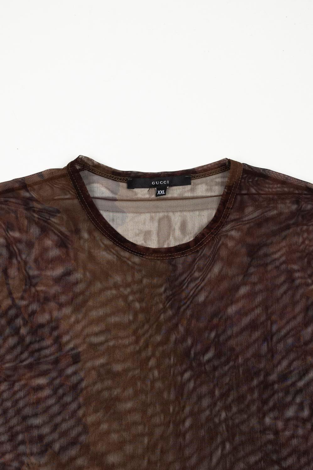Check my other listings. Have many more designer clothes for sale. Open to any offers.
Item for sale is 100% genuine Gucci Floral Transparent Men T-Shirt, S507
Color: Brown
Material: No care label/ nylon blend
Tag size: XXL S507
This t shirt is