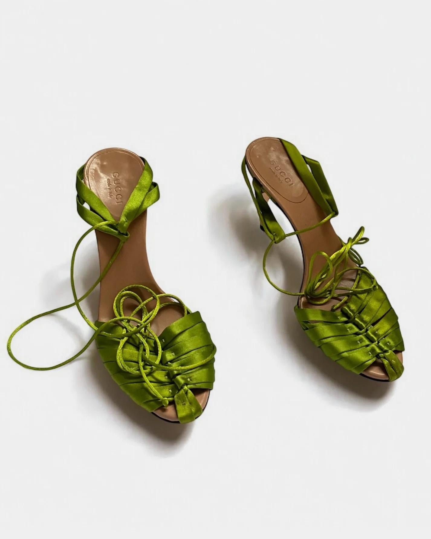 Gucci by Tom Ford green lace up heels, Spring Summer 2004
Very good vintage condition
Seen on runway (in a slightly different version — higher corset up foot) in multiple looks as well as the season campaign 
Size: EUR 36.5