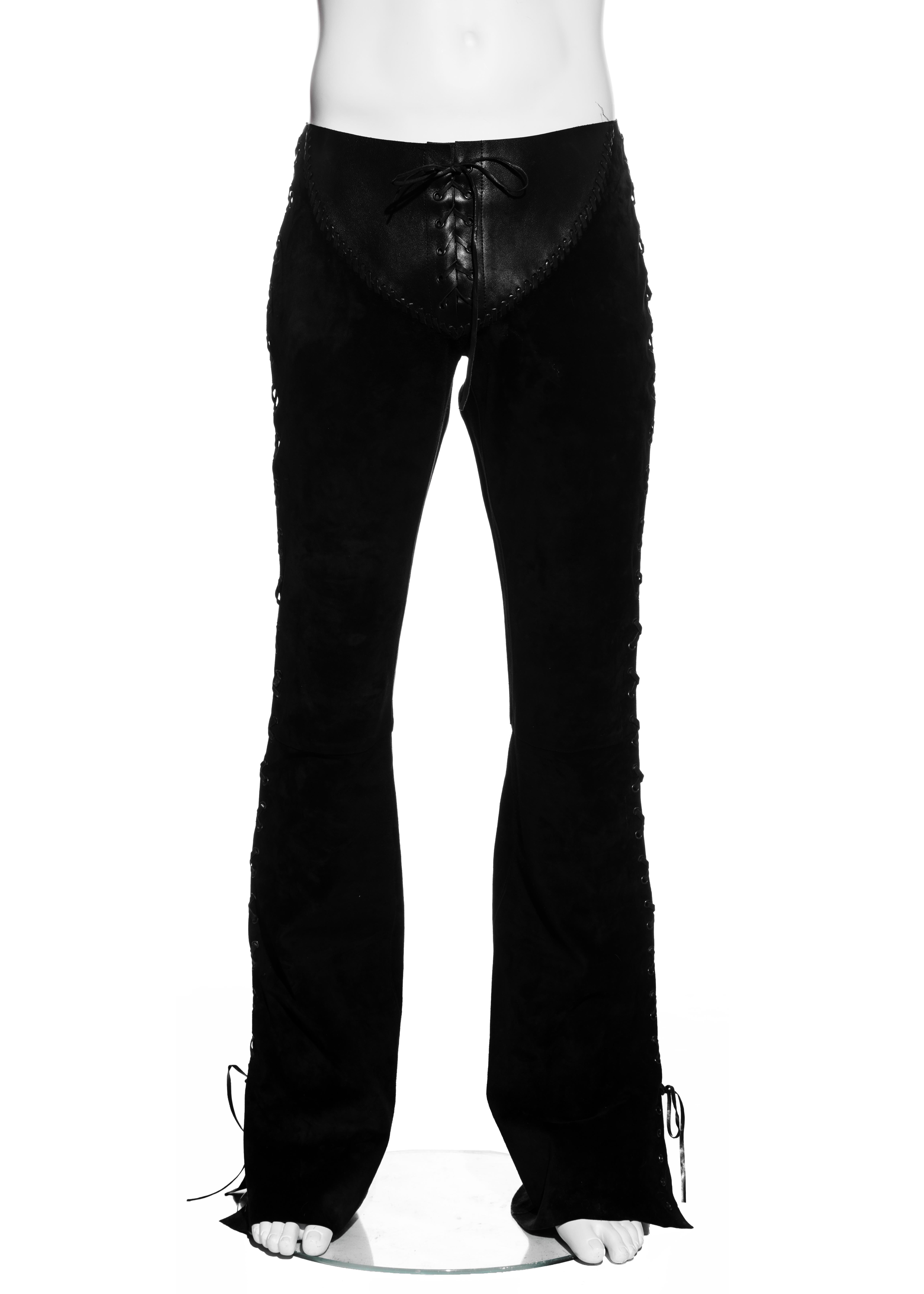▪ Gucci men's leather and suede flared pants 
▪ Designed by Tom Ford
▪ Leather lace up fastenings at side seams and  crotch
▪ Metal grommets 
▪ Leather braided trim 
▪ Size 48
▪ Spring-Summer 2004