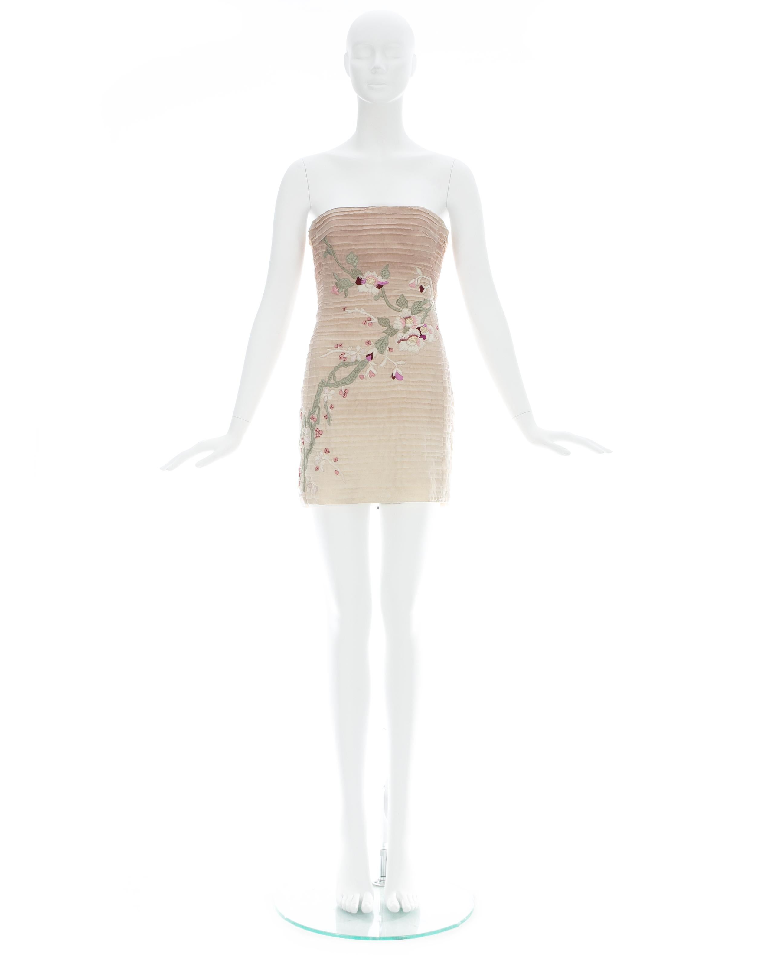Gucci by Tom Ford; Pink silk embroidered strapless mini dress with hand-sewn embroidery and built-in bustier 

Spring-Summer 2003