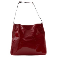 Sac à bandoulière Gucci par Tom Ford en cuir verni rouge à anneaux métalliques, automne-hiver 1997 