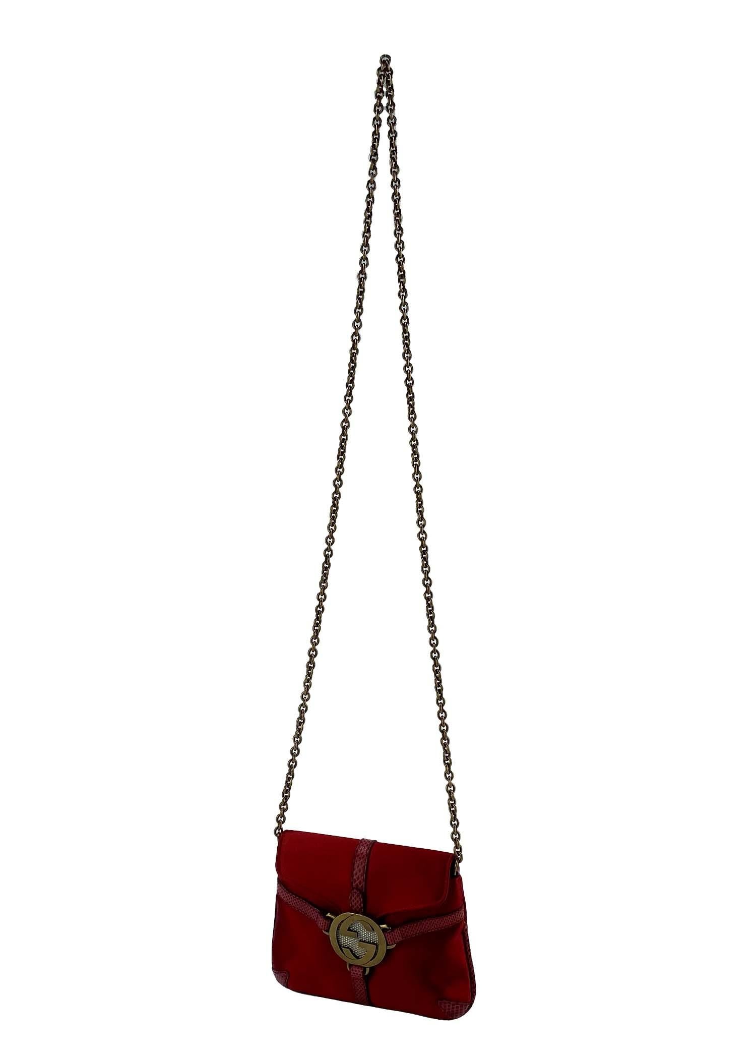 TheRealList presents: a rare red silk, rhinestone, and karung snakeskin mini reins crossbody bag by Tom Ford for Gucci. This early 2000's bag features a 'GG' accent at the front meant to emulate Ford's infamous Gucci 'GG' thongs from the