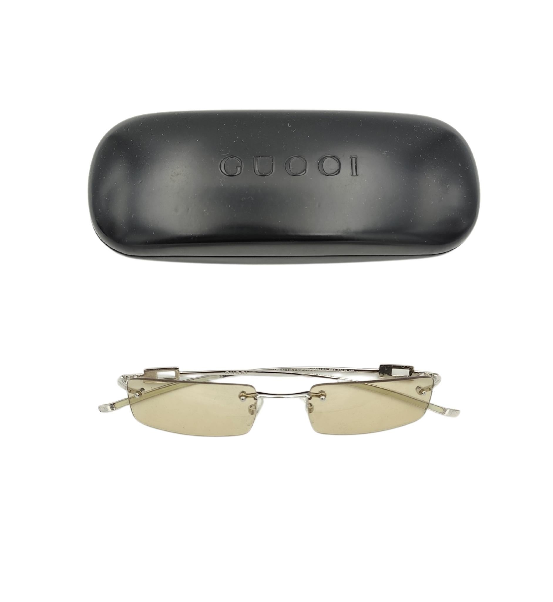 Gucci by Tom Ford sunglasses
Rimless
Yellow lenses
Rhinestones logo

Great condition
Original case