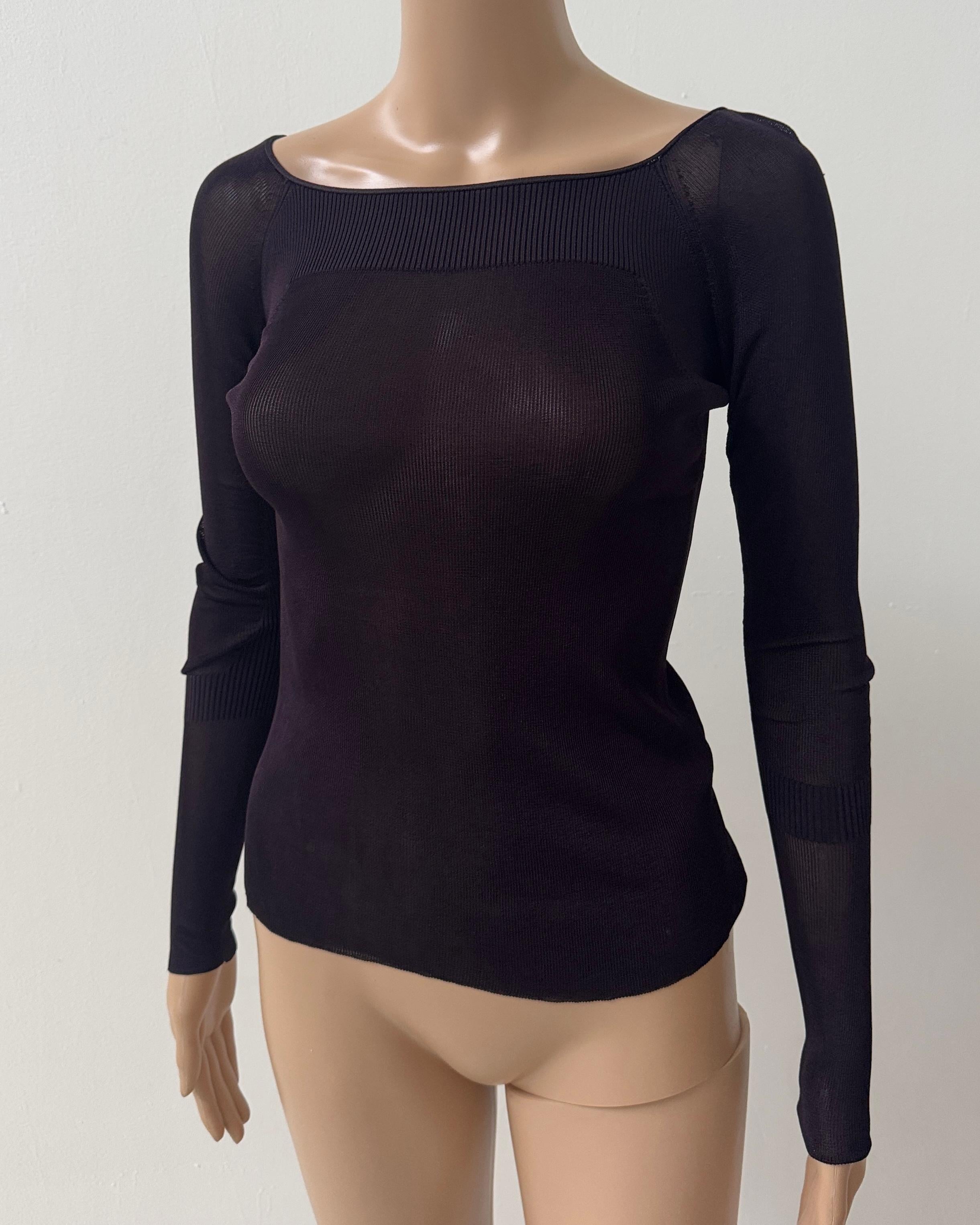 This incredibly rare sheer knit top comes directly from the Spring/Summer 1998 runway collection designed by Tom Ford for Gucci-an era widely considered the creative peak of the brand. Worn on the catwalk, this piece perfectly captures the
