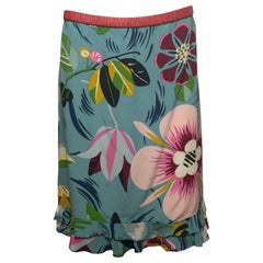 Gucci by Tom Ford, Frühjahr/Sommer 1999: Rock in Blaugrün mit botanischem Print und doppeltem Rüschenbesatz am Saum