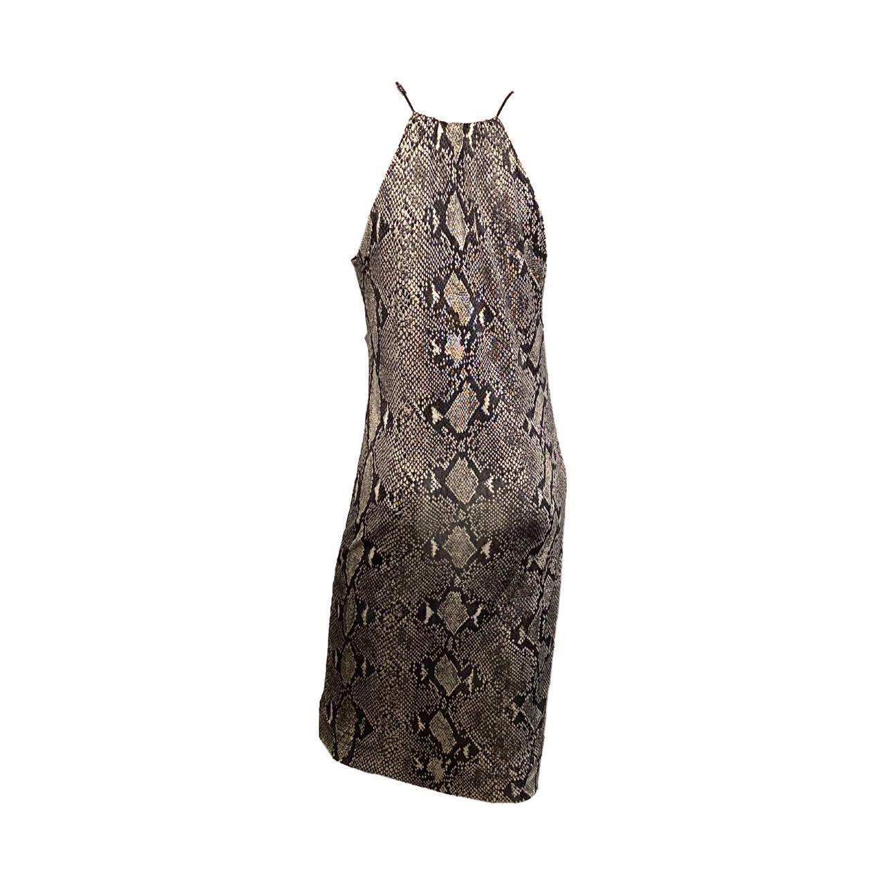 Tom Ford for Gucci grey snake skin print halter dress in silk from the S/S 2000 collection.

Double cut out details on the front, black leather cord at the neckline with small silver Gucci clasp. 

Same model seen both on runway (Look 2) and