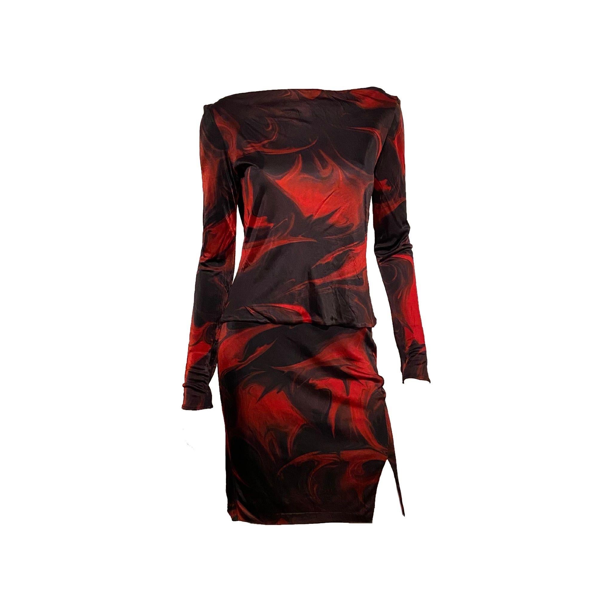 Tom Ford Era Gucci Two-piece Set with low back top plus matching mini skirt with side slit, featuring a red/black graphic swirl print from the Men’s Spring/Summer 2001 collection

100% viscose, Made in Italy

Size IT 40 


Top:
Bust - 108 cm / 42.5