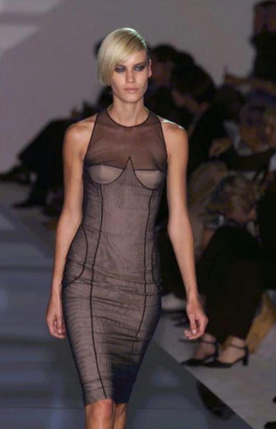 Gucci By Tom Ford Spring Summer 2001 Vintage Mesh Corset Runway Dress - This dress has the original tags attached. 

Brand: Gucci 
Designer: Tom Ford
Collection / Year: Spring Summer 2001
Material: Spandex / Nylon
Color: Black / Pale Beige
Size: