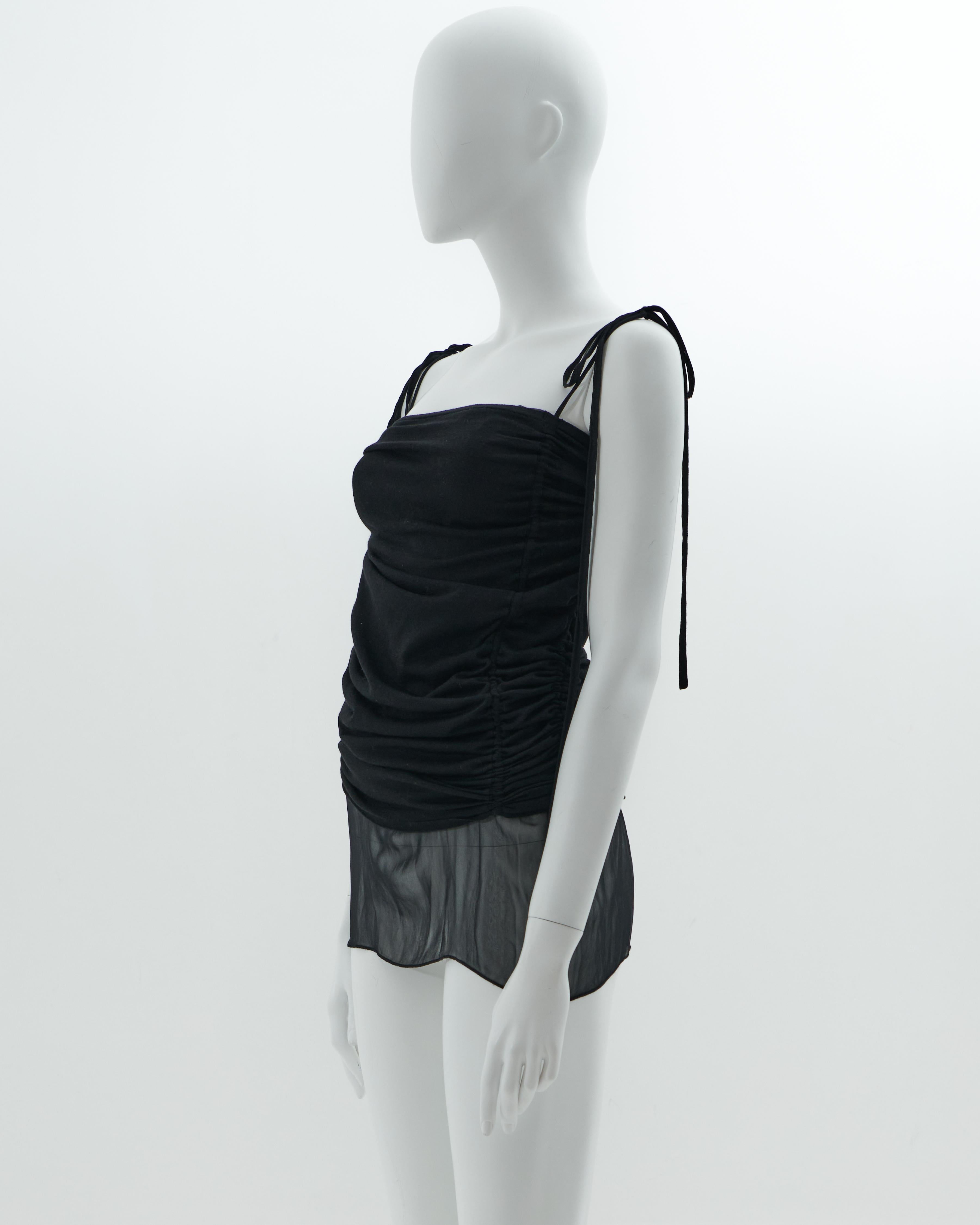 - Designed by Tom Ford 
- Sold by Skof.Archive 
- Spring-Summer 2003 
- Black silk draped top with adjustable straps 
- Vertical double adjustable drapes on hips 
- Made in Italy

Condition: Excellent 
Wear consistent with age and use. 
Light wear