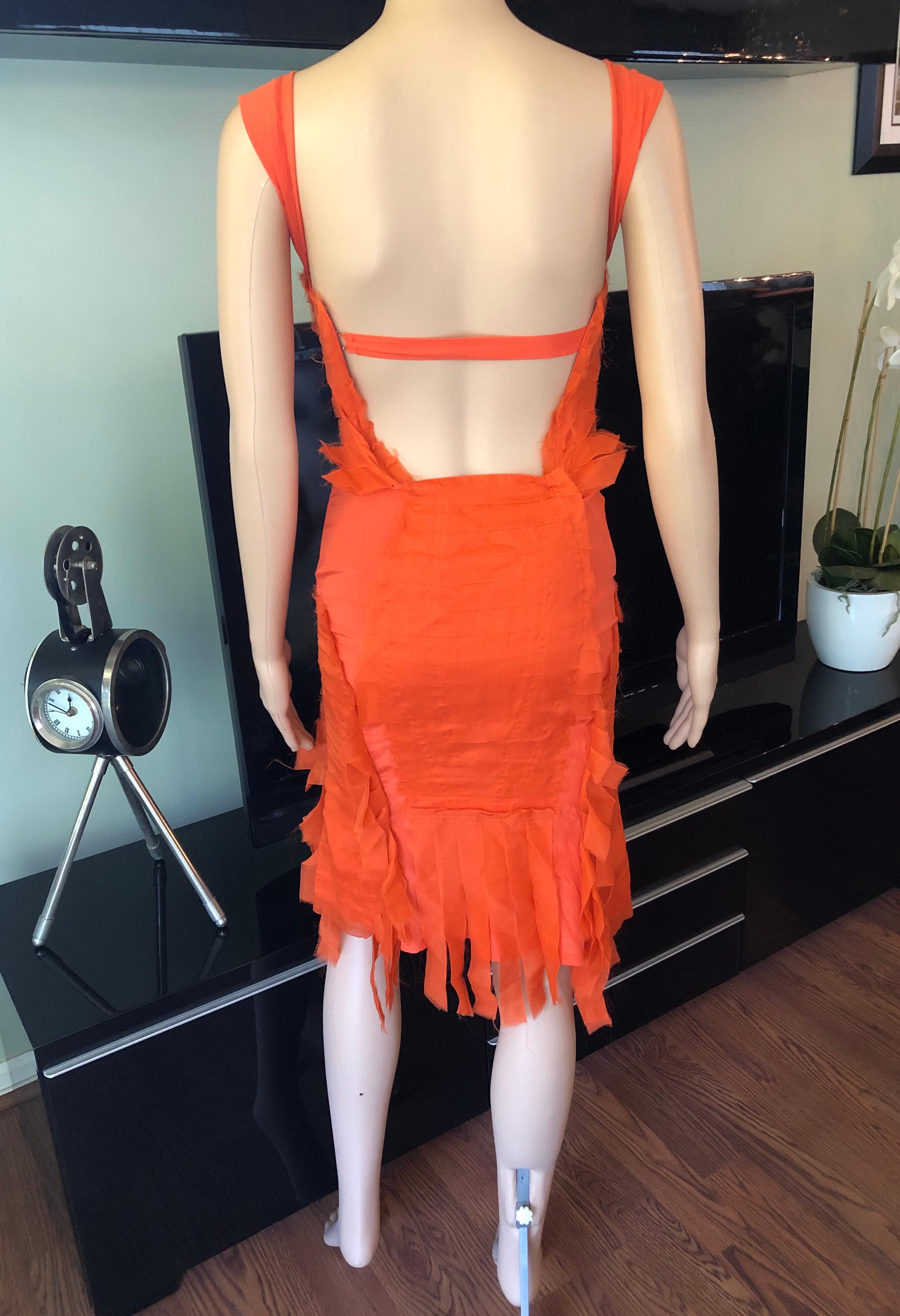 Gucci by Tom Ford S/S 2004 Runway Bustier Silk Open Back Tangerine Dress IT 38

Gucci stretchy silk dress featuring bustier plunging neckline, fringe trim at hem, frayed detail, open back with hook-and-eye closures and concealed zip closure at side.
