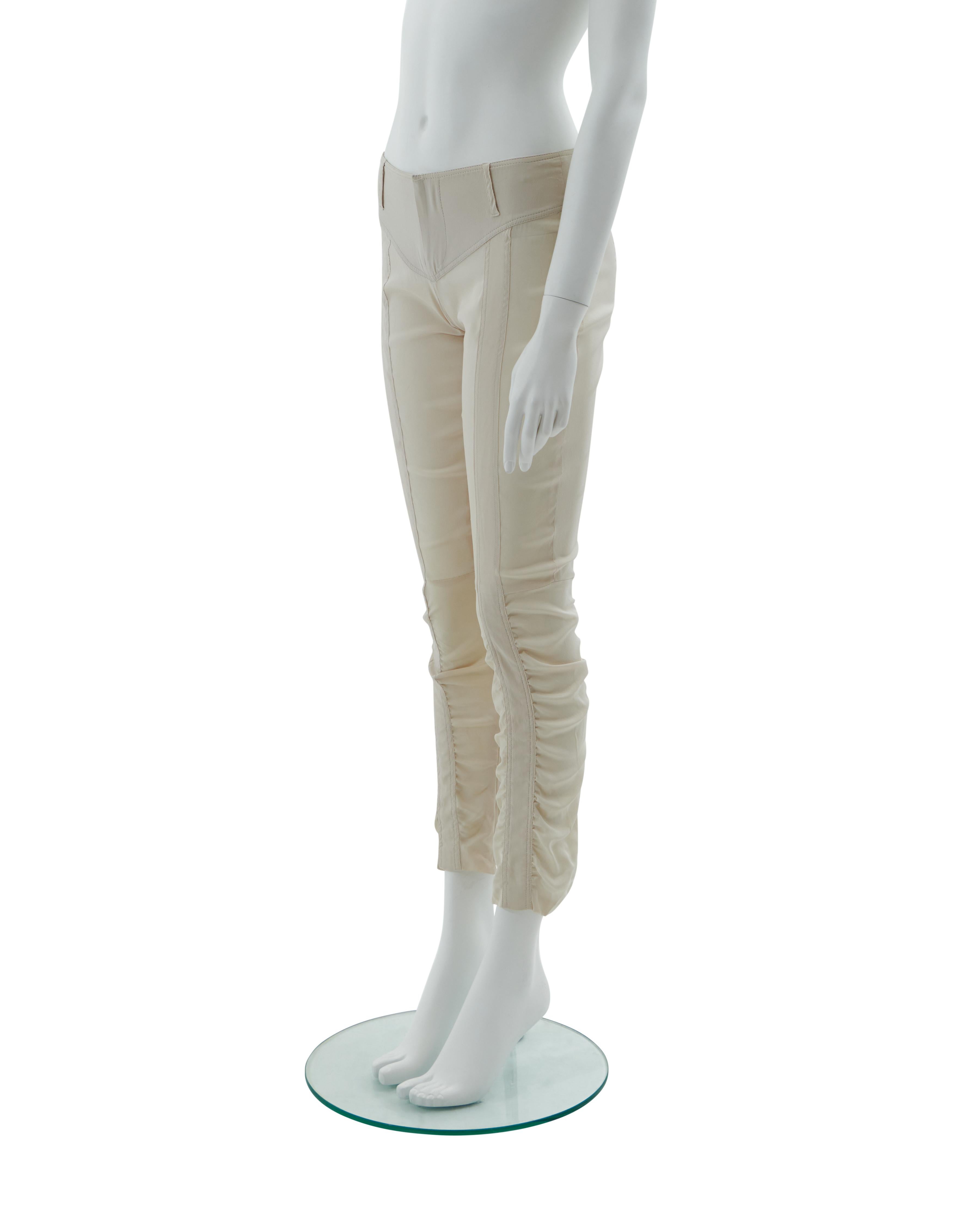 - Designed by Tom Ford
- Form-fitting silk pants
- Feature ruching at the calves
- Low rise
- S/S 2004 
- Made in Italy
- Condition : Excellent, Wear consistent with age and use. Light wear from age and use throughout.
- Composition : 90% Silk 10%