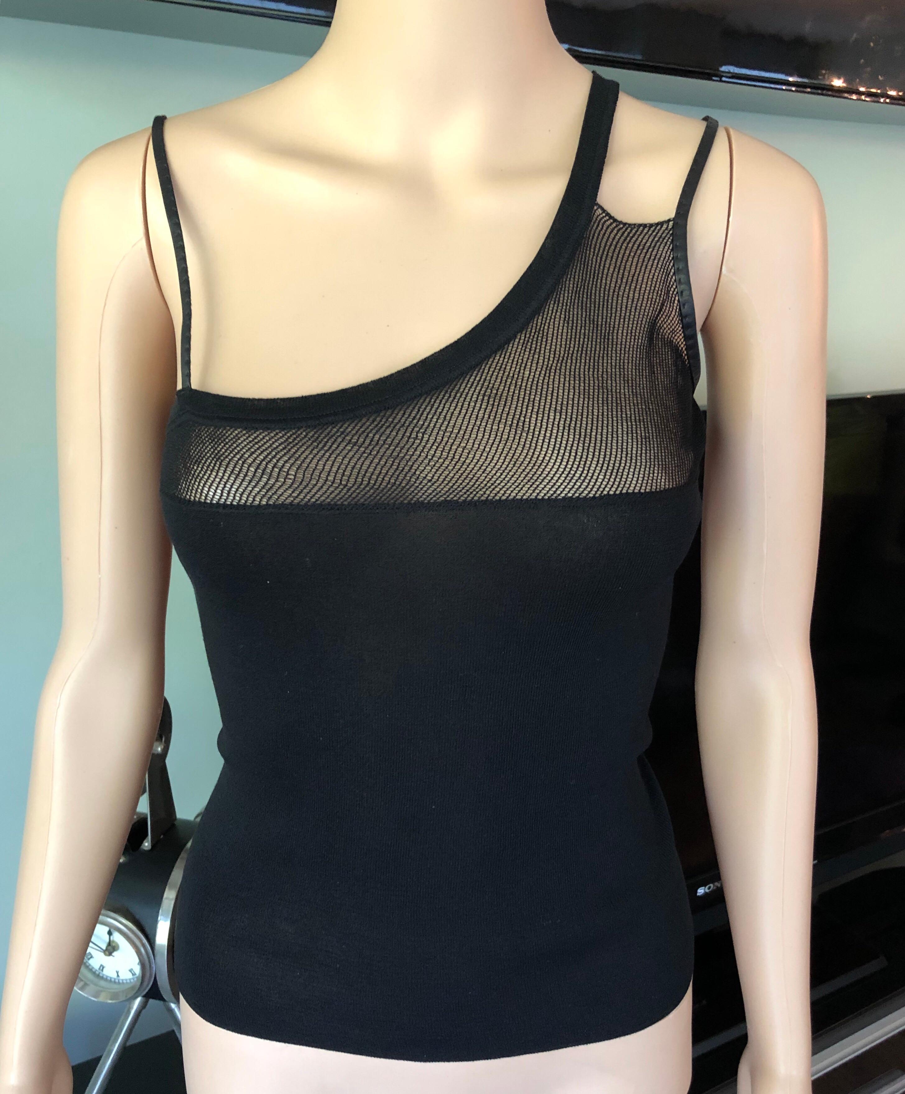 Gucci by Tom Ford Semi Sheer Knit Black Top Size S

Black Gucci sleeveless semi-sheer knit top with asymmetrical neckline featuring sheer mesh panel
