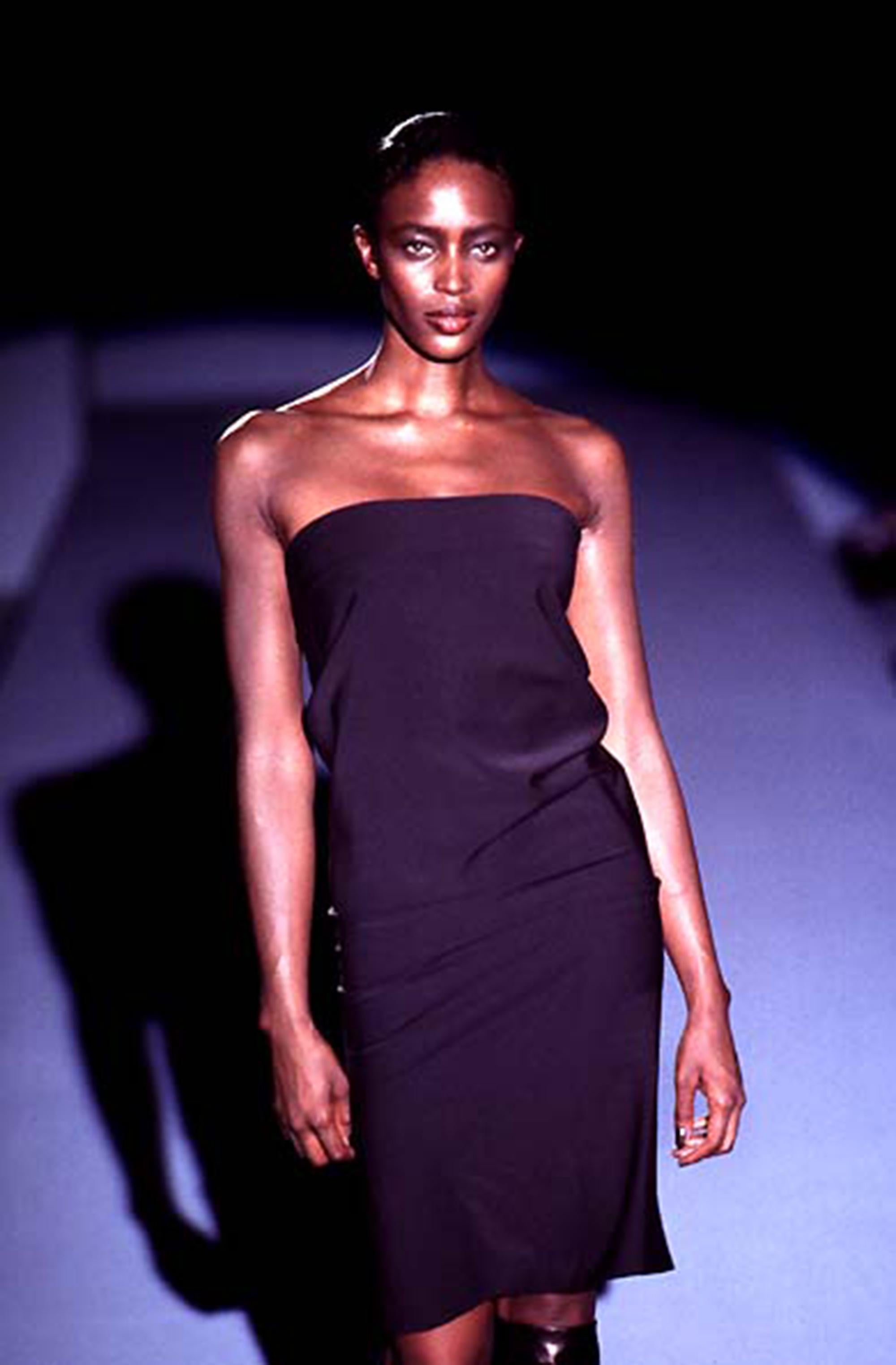 Gucci By Tom Ford S/S 1997 Runway Tube Dress in Black

Brand: Gucci
Designer: Tom Ford
Collection: Spring Summer 1997
Fabric: Wool 89% / Nylon 6% / Spandex 5%
Color: Black
Size: IT42

The opening look from Tom Ford’s Spring Summer 1997 collection