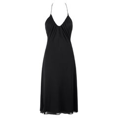 Vestido halter de jersey de seda negro de Gucci by Tom Ford, colección primavera-verano 2000, con espalda abierta en forma de capucha, talla 44