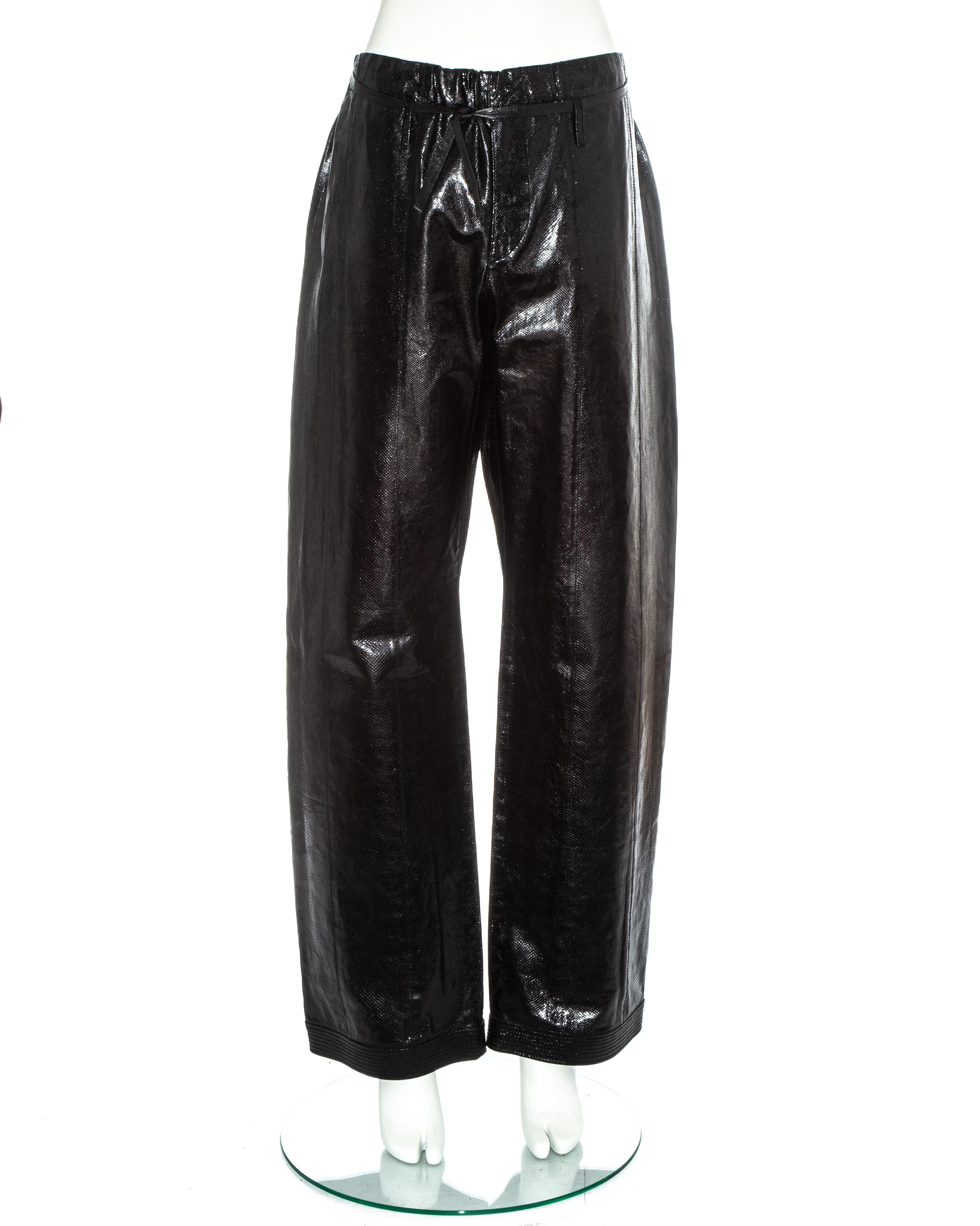 Gucci by Tom Ford; unisex black lizard skin wide leg drawstring evening pants

Spring-Summer 2001