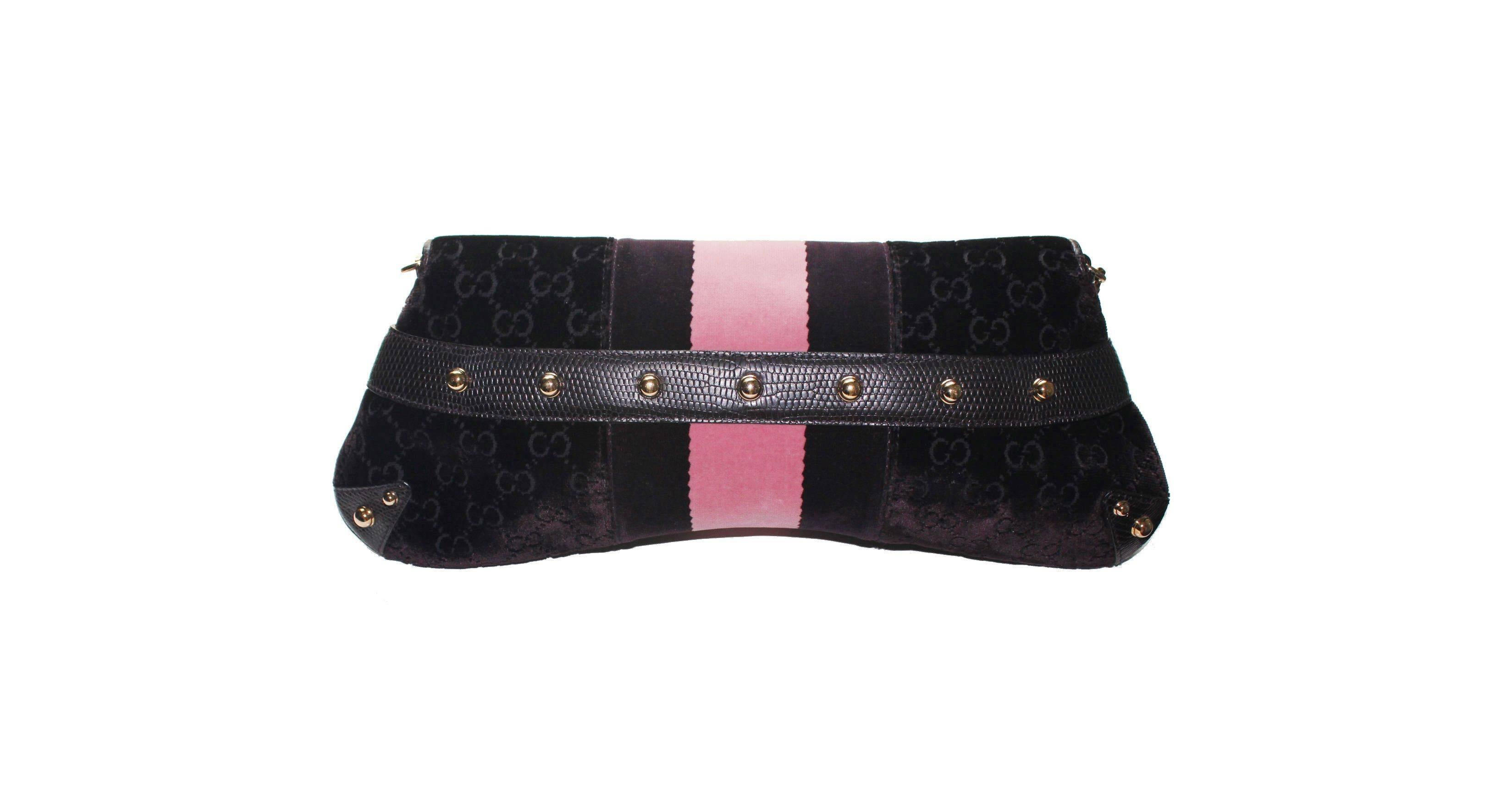 A Gucci by Tom Ford Evening Bag

Limited Edition only sold in selected Gucci flagship stores
Beautiful eggplant velvet with the famous GG logo monogram
Exotic lizard skin trimmings - no print!
Famous Gucci signature horsebit design
Velvet web