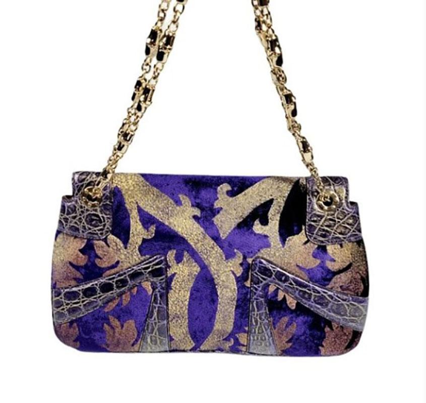 GUCCI

The Tom Ford Gucci dragon bag was born, and today is a rare collector’s item that’s still too relevant to be a relic. With (rather heavy) gold bamboo-style chain handles, richly toned leather accents, peekaboos of velvet (in certain styles),