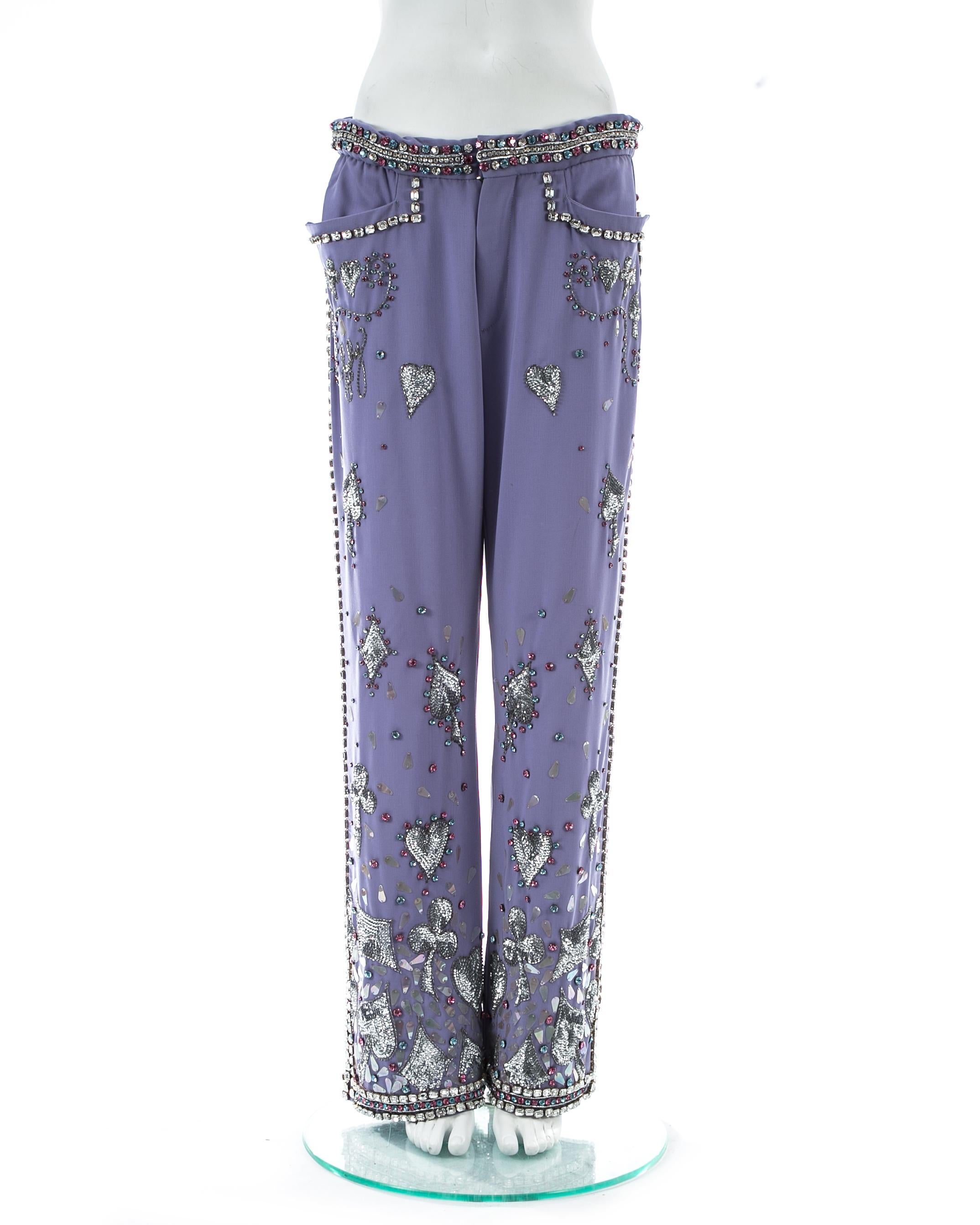 Gucci by Tom Ford; violet cotton evening pants embellished with rhinestones and sequins. Wide leg fit. sitting on the hips. 

Spring-Summer 1999