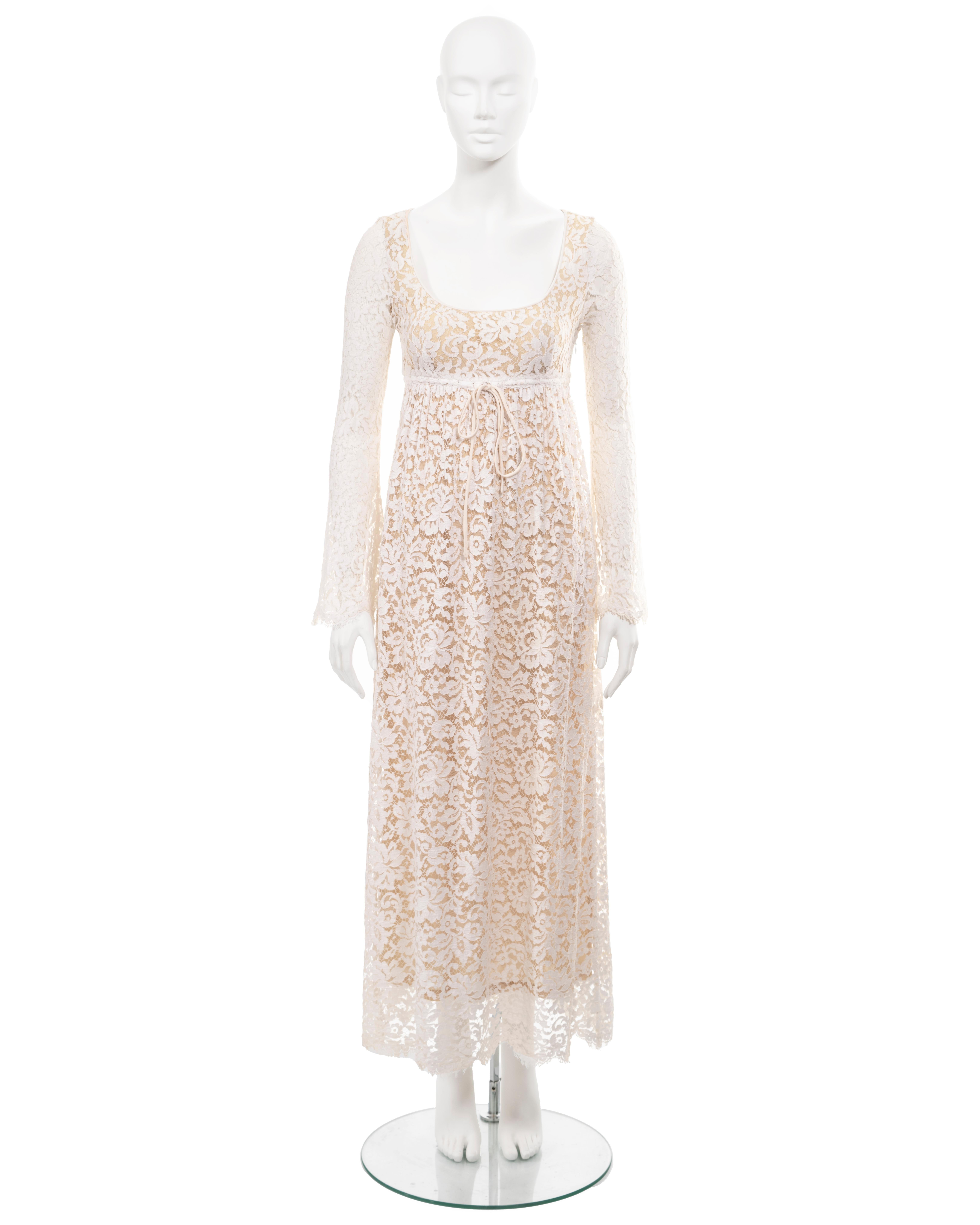 ▪ Gucci empire-line maxi dress
▪ Creative Director: Tom Ford
▪ Spring-Summer 1996
▪ Constructed from white lace 
▪ Long bell sleeves
▪ Square neckline 
▪ Drawstring fastening under the bust 
▪ Nude silk chiffon lining 
▪ IT40 - FR36 - UK8 - US4
▪