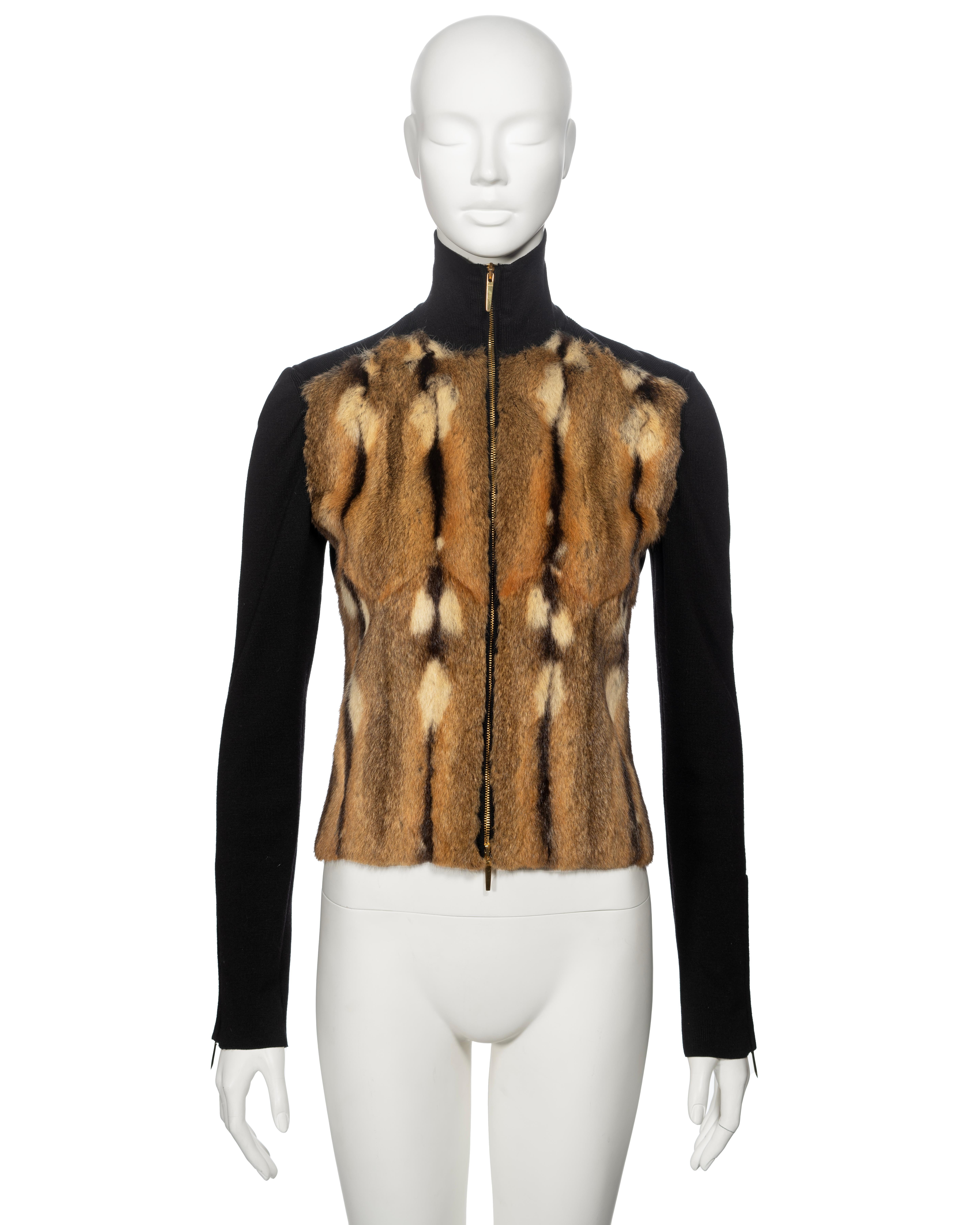 ▪ Gucci Fur Trapper Hat 
▪ Creative Director: Tom Ford 
▪ Fall-Winter 2000
▪ Brindled multi-tone fur 
▪ Black rib knit sleeves, turtleneck and back panel 
▪ Two-way gold-tone metal zipper with 'Gucci' engraved pulls 
▪ Size: Extra Small 
▪ Made in