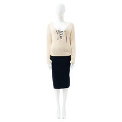 Gucci by Tom Ford	F/W 2002 Set: White Laced Sweater and black midi skirt