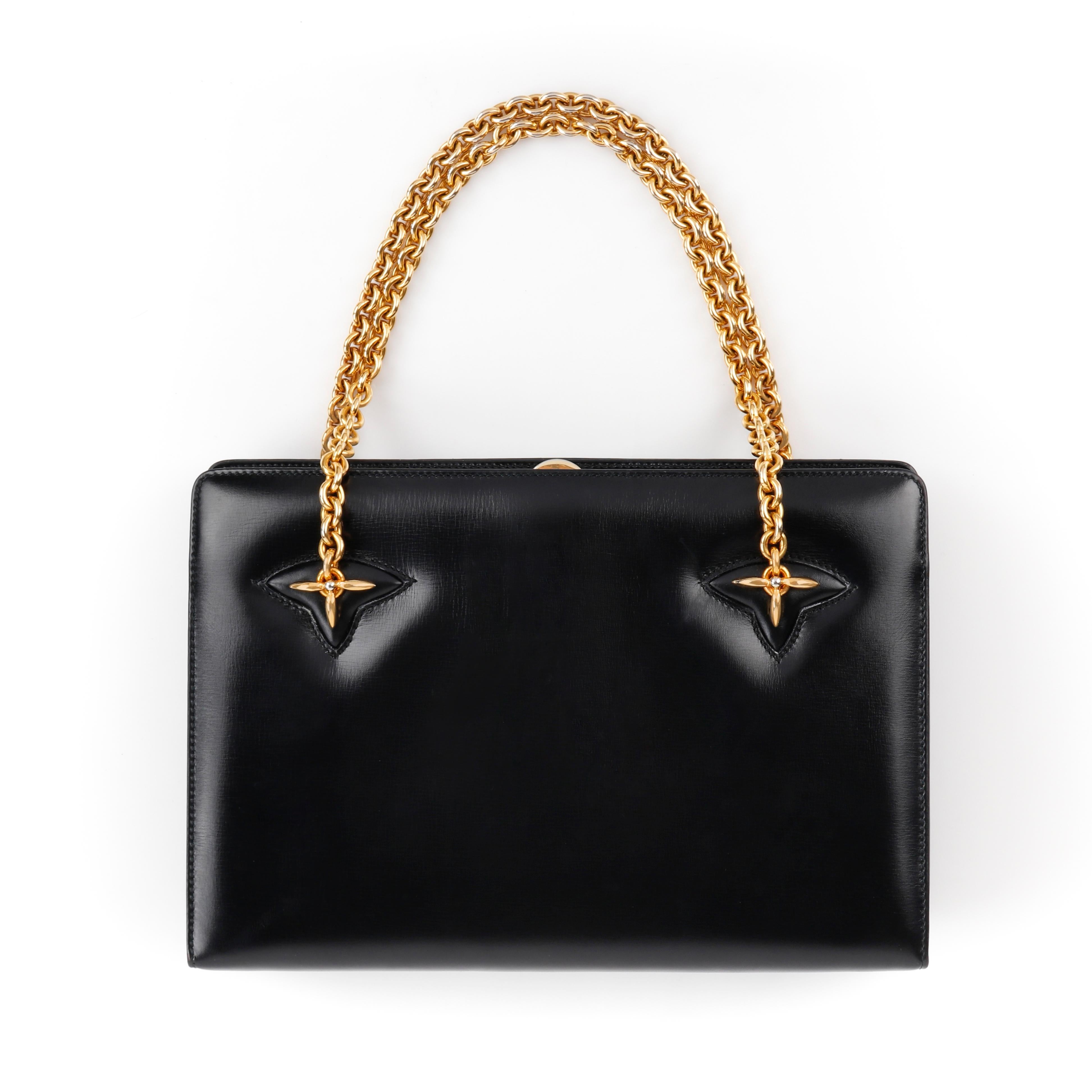 GUCCI c.1960’s Black Leather Gold Chain Link Push Lock Handbag RARE
 
Circa: 1960’s 
Label(s): Gucci 
Style: Handbag
Color(s): Black
Lined: Yes
Unmarked Fabric Content: Leather 
Additional Details / Inclusions: Black structured handbag; attached