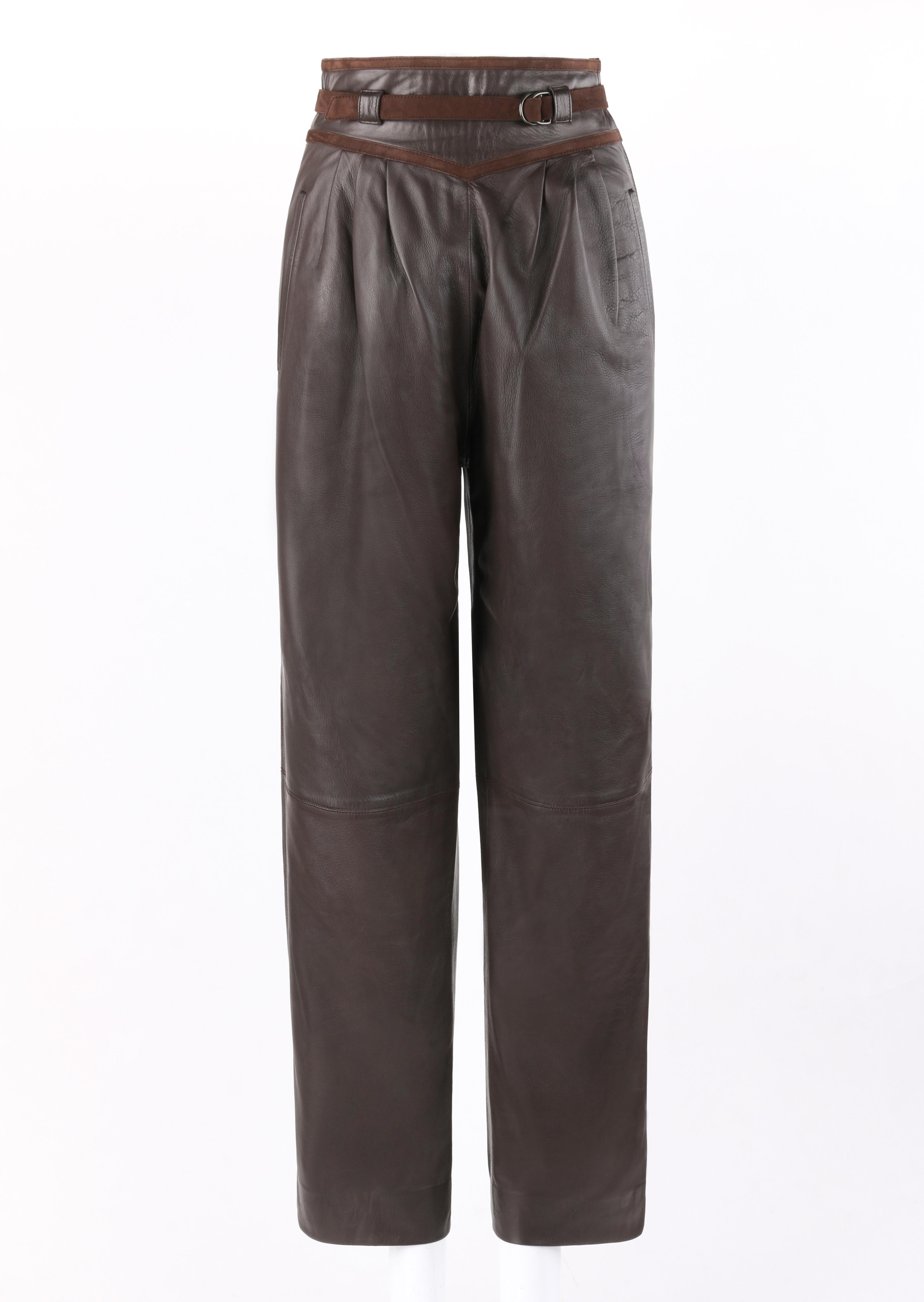 Tan France Auction Pick

GUCCI c.1970’s Dark Brown Leather High Waisted Tapered Trouser Pants
 
Circa: 1970’s
Label(s): Gucci 
Style: Trouser pants
Color(s): Dark brown
Lined: Yes
Marked Fabric Content: 100% Genuine Leather 
Additional Details /