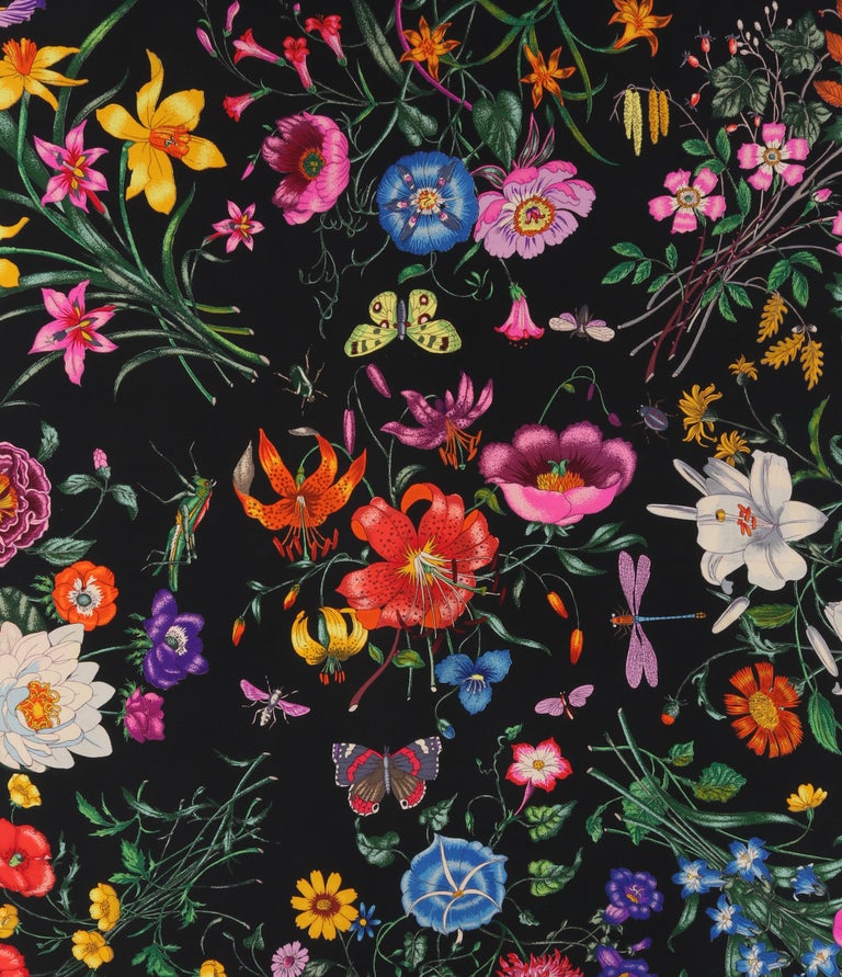 GUCCI c.1960’s Vittorio Accornero “Flora” Black Multicolor Floral Silk Square Scarf
 
Brand/Manufacturer: Gucci
Circa: 1970’s
Designer: Vittorio Accornero
Style: Square scarf
Color(s): Background: black; floral print: shades of pink, blue, green,