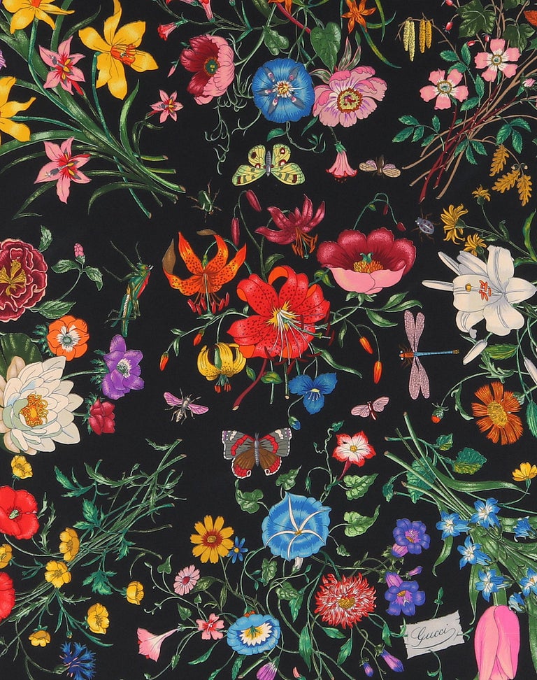 GUCCI c.1970’s Vittorio Accornero “Flora” Black Multicolor Floral Silk Scarf
 
Brand/Manufacturer: Gucci
Circa: 1970’s
Designer: Vittorio Accornero
Style: Square scarf
Color(s): Background: black; floral print: shades of pink, blue, green, yellow,
