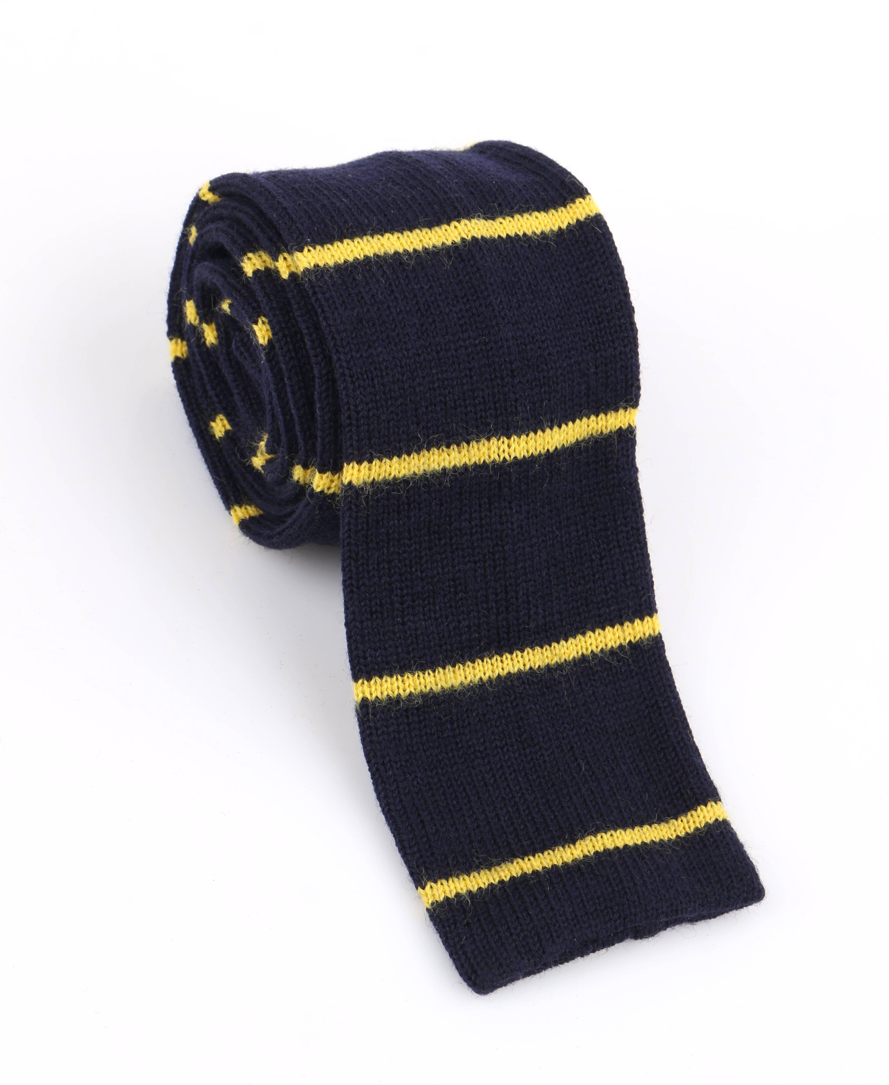 Vintage Gucci c.1980's navy blue and yellow striped wool knit necktie; New old stock. Navy blue and yellow horizontal striped knit. Square end. Marked Fabric Content: 