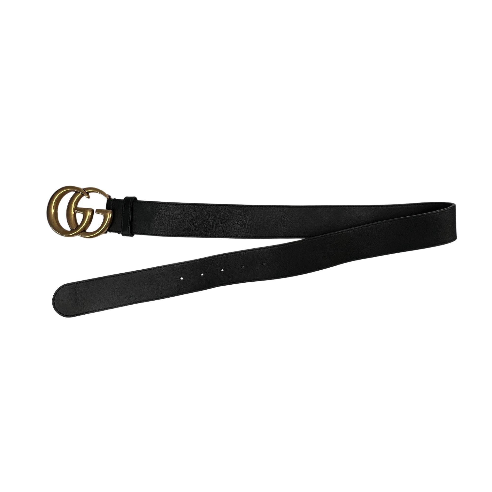 This stylish belt is made of black calfskin leather and features an interlocking GG buckle in antique brass.

COLOR: Black
ITEM CODE: 400593
MEASURES: L 34.5” x W 1.5” (belt) & 6cm x 8cm (GG buckle)
SIZE: 75cm/30inch
COMES WITH: Dust bag and