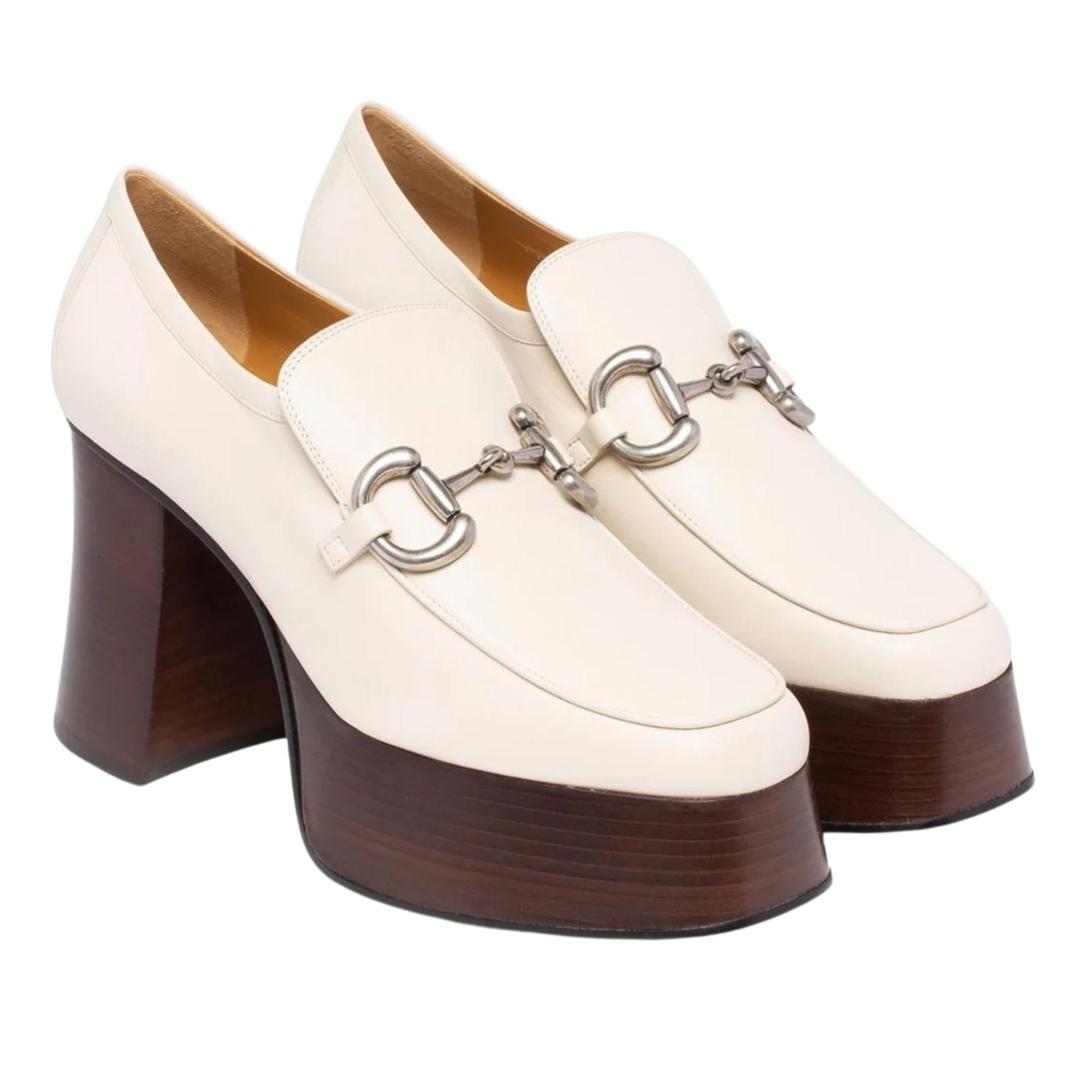 Color: mystic white
Material: calfskin leather with a wood platform
Model No. 715138

EU 39
Heel Height: 120 mm / 4.7”
Platform Height: 30 mm / 1.2” 
Condition: Excellent. New shoes.
Comes with: Dust bag and box

Made in Italy