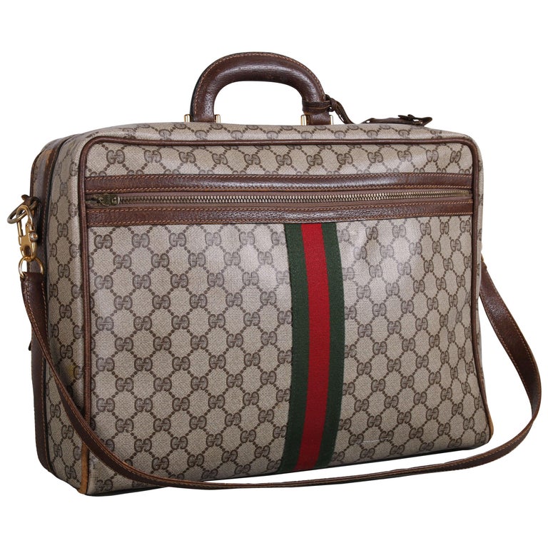 Gucci Canvas and Leather Travel Bag w/GG Diamond , Top Handle and Strap & at 1stDibs gucci