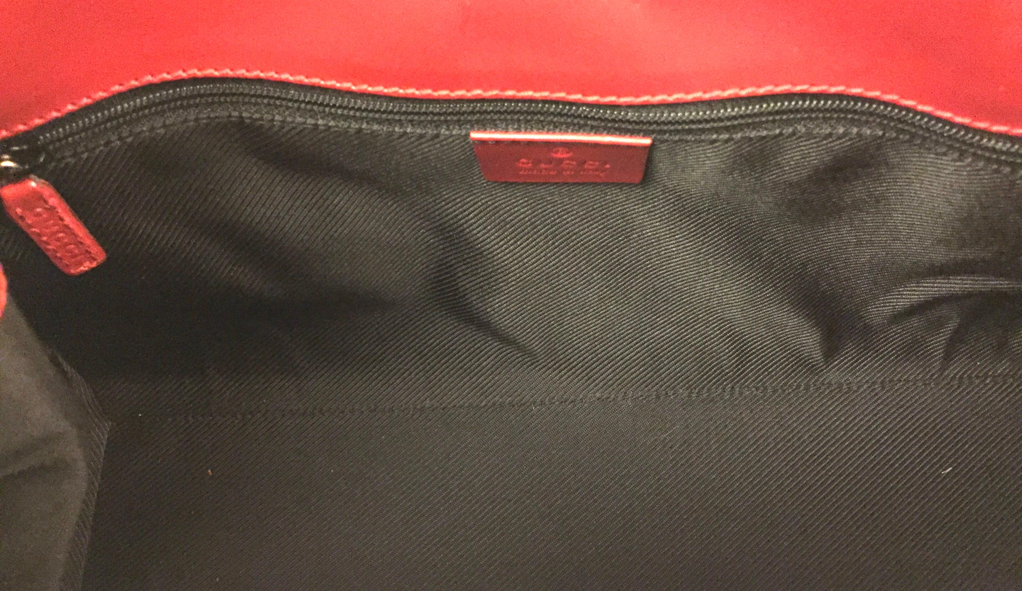 Brown Gucci canvas monogram red piping handbag