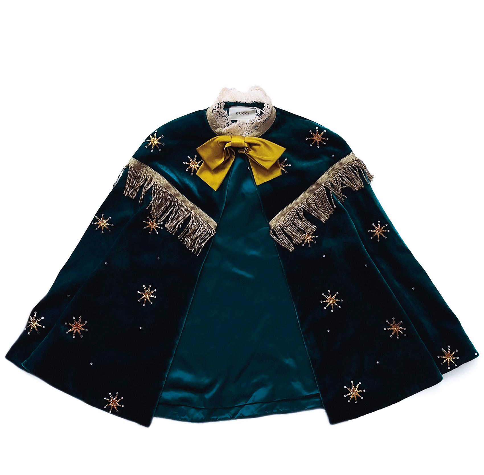 
Father, Son and House of Gucci <3

So obsessed with this gorgeous SHOWSTOPPER piece!
Rare and so beautiful GUCCI silk velvet Cape, new with tag.
Dark teal velvet with the most amazing lavish embellishment. Gold tassles, rhinestones and glitter lamé